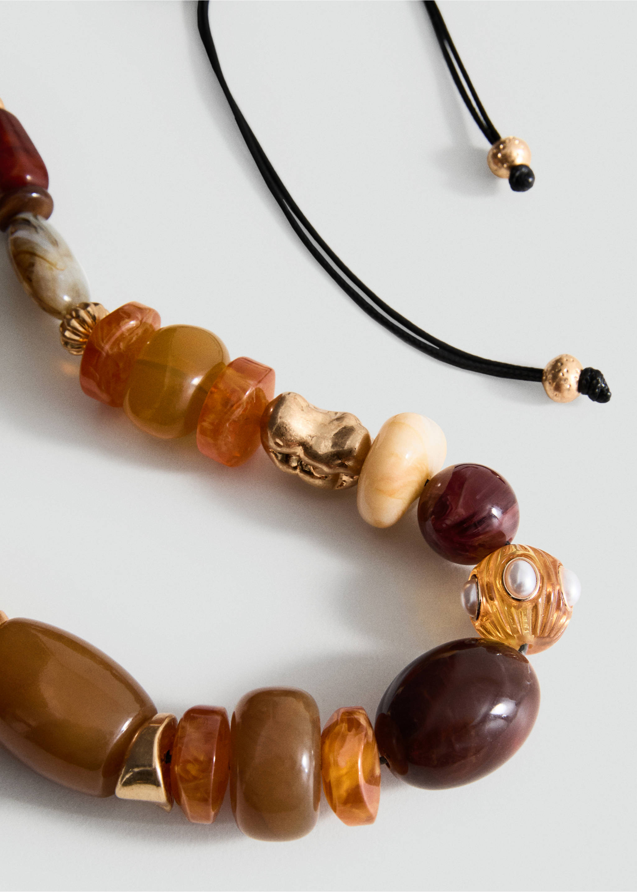 Gecombineerde ketting met maxibollen van hars - Middenvlak, Bruin. Ref: 17001197-00.