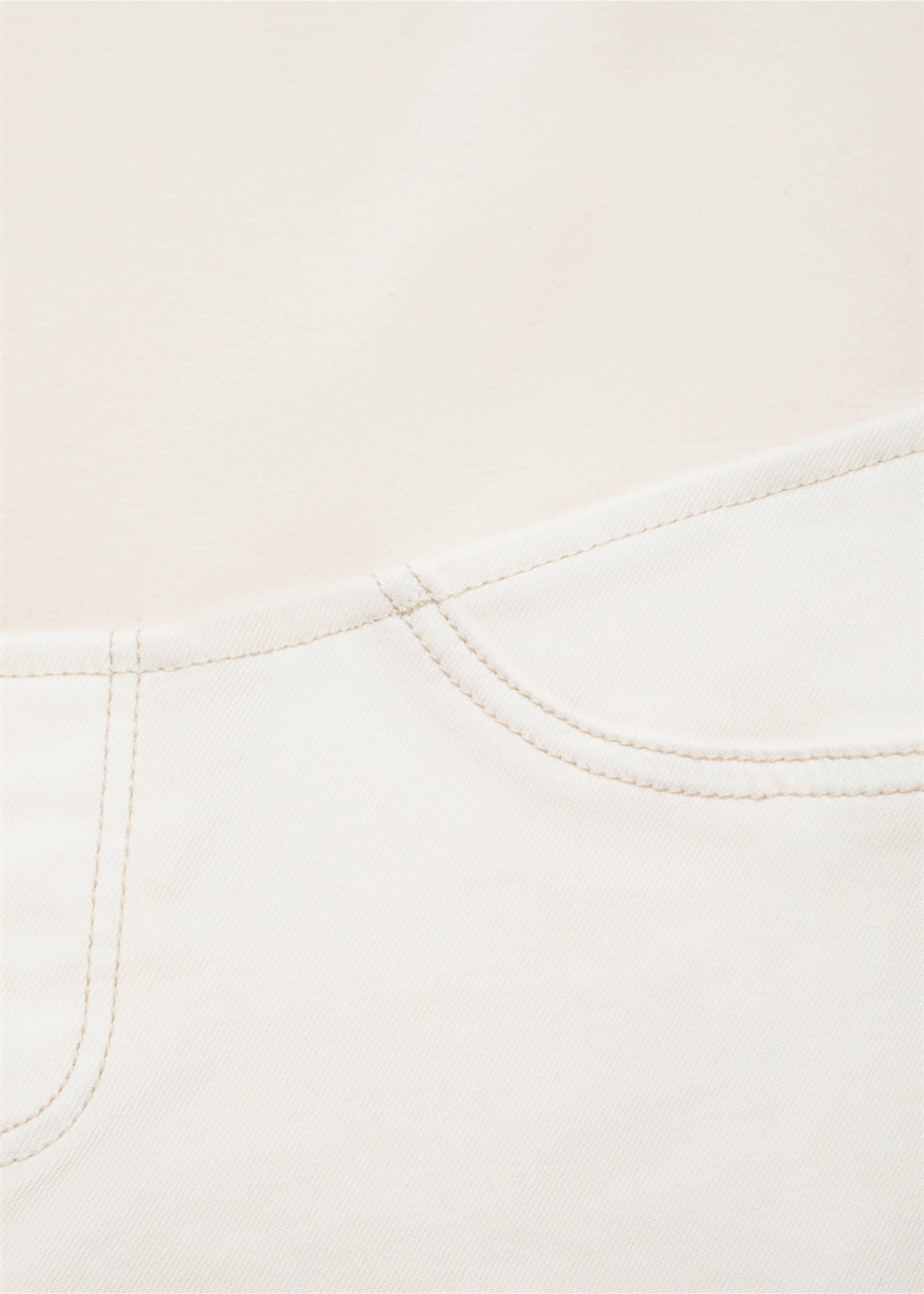 Close-up of white denim trousers showing front pocket detail., Off White. Ref: 17001234-00.