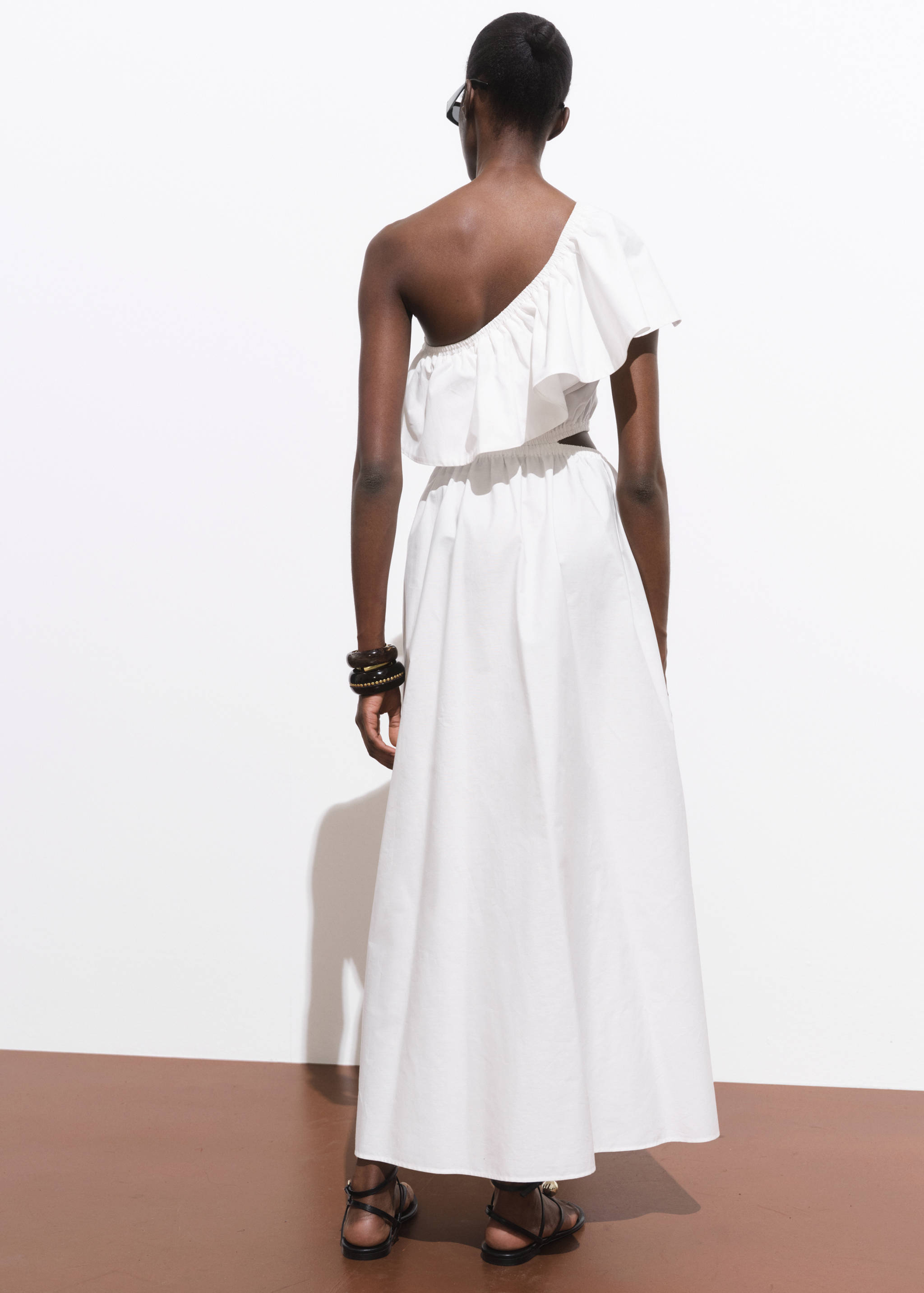 Asymmetrical dress with cut-out - Reverse of the article
