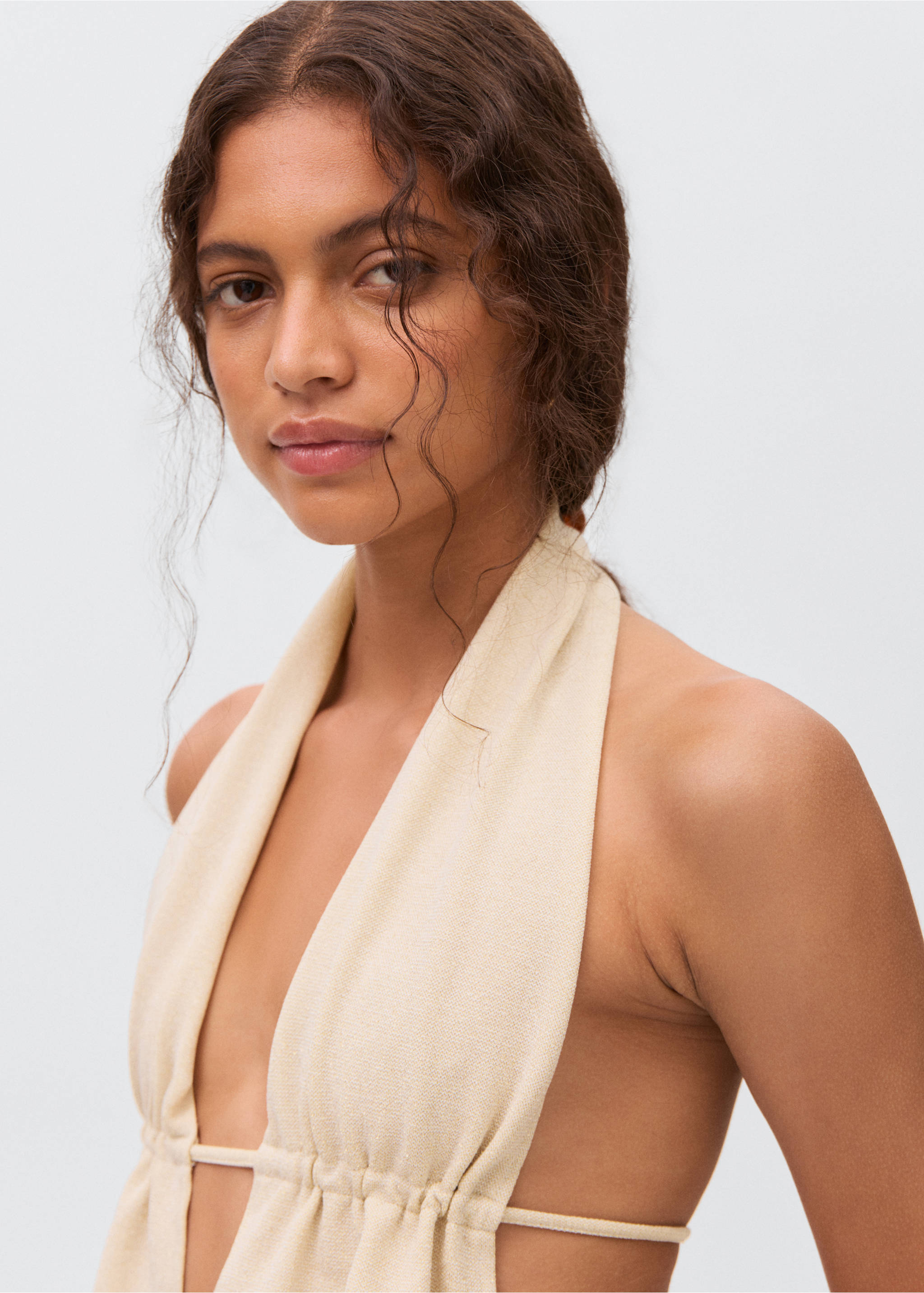 Lurex-knit halter top - Details of the article 1, Gold. Ref: 17001290-00.