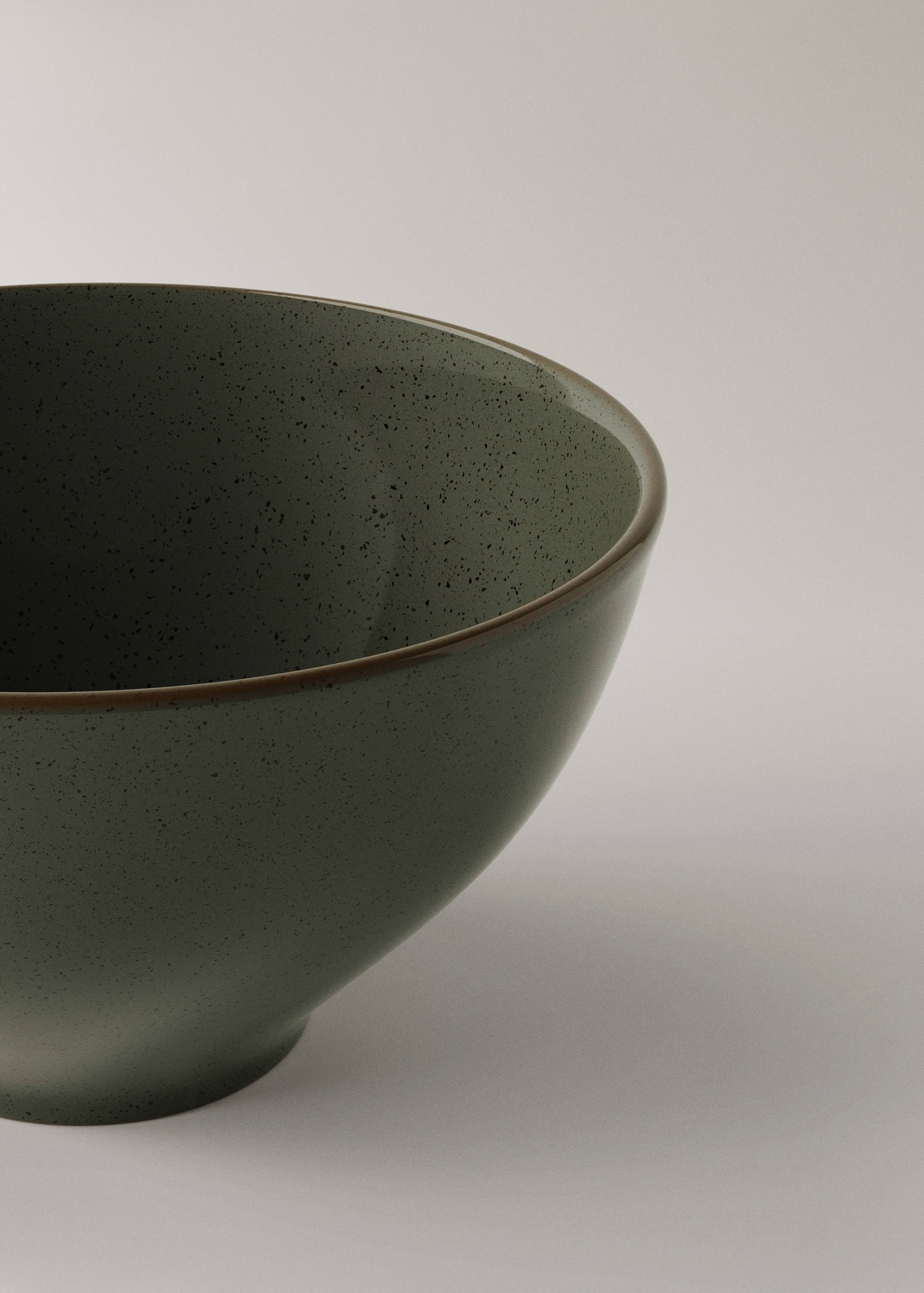 Stoneware bowl with spots - Details of the article 1