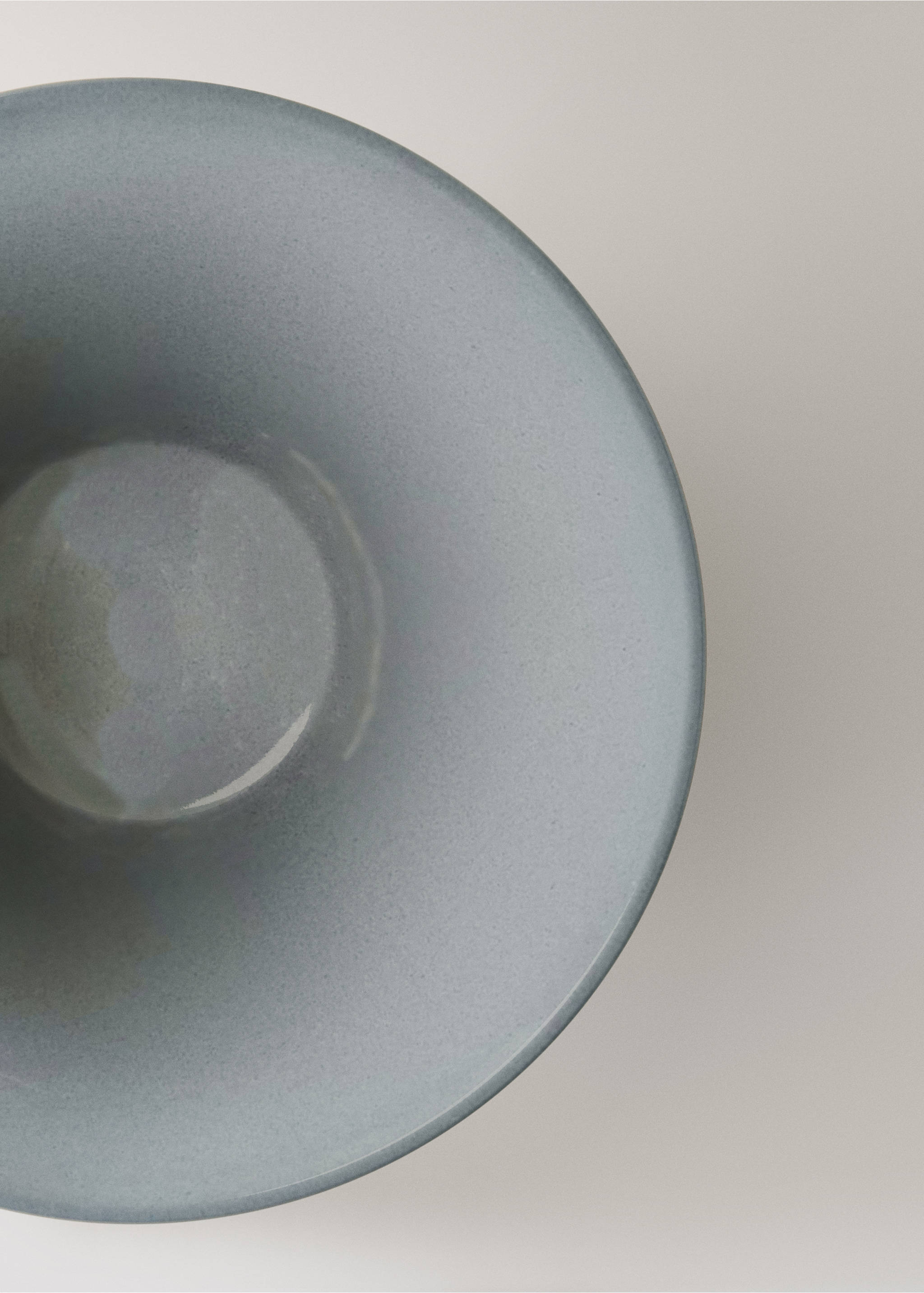 Close-up of a blueish-grey ceramic bowl., Night Blue. Ref: 17002047-00.