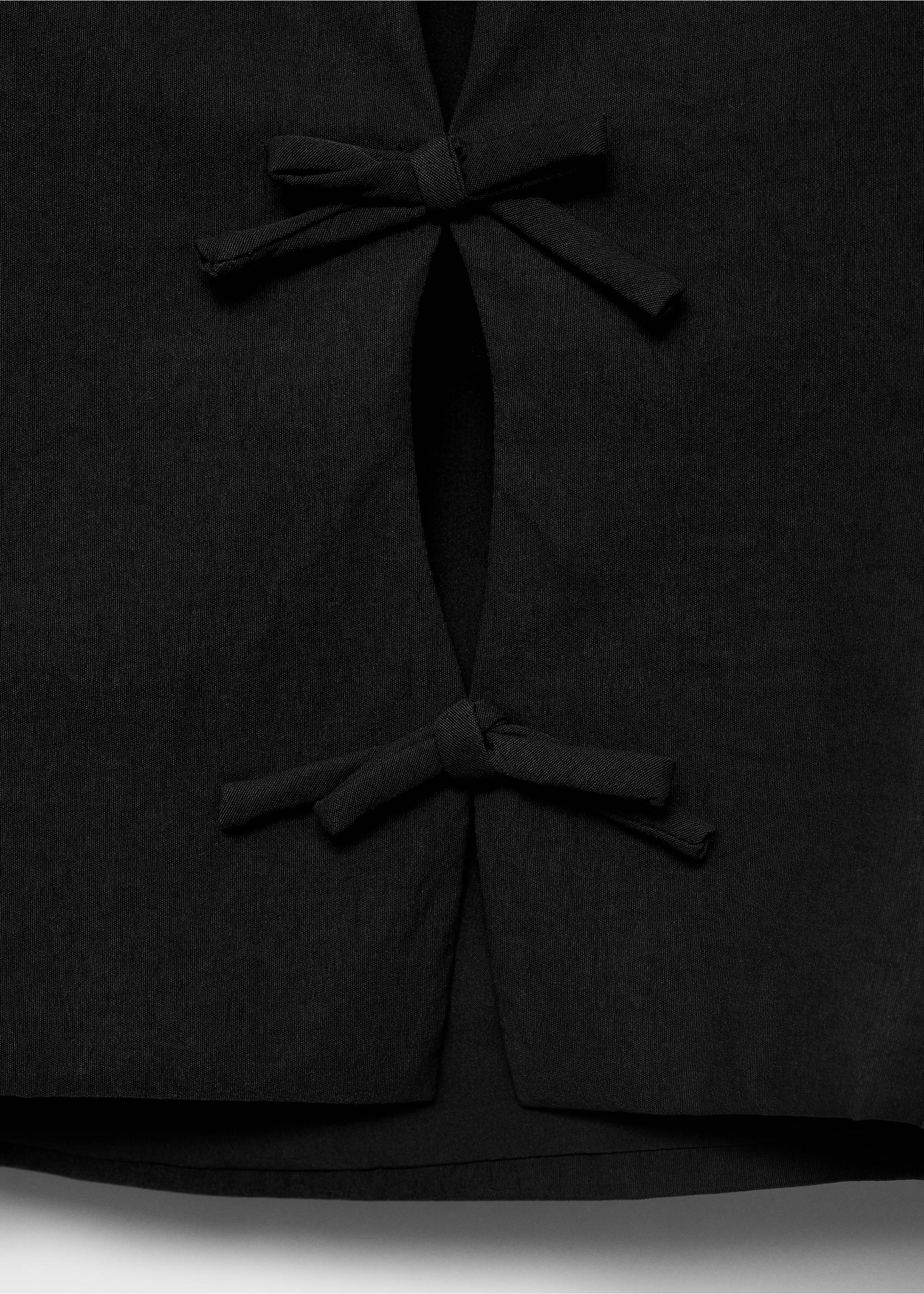 Top mit Schleifen am Rücken - Detail des Artikels 0, Schwarz. Ref: 17002905-00.
