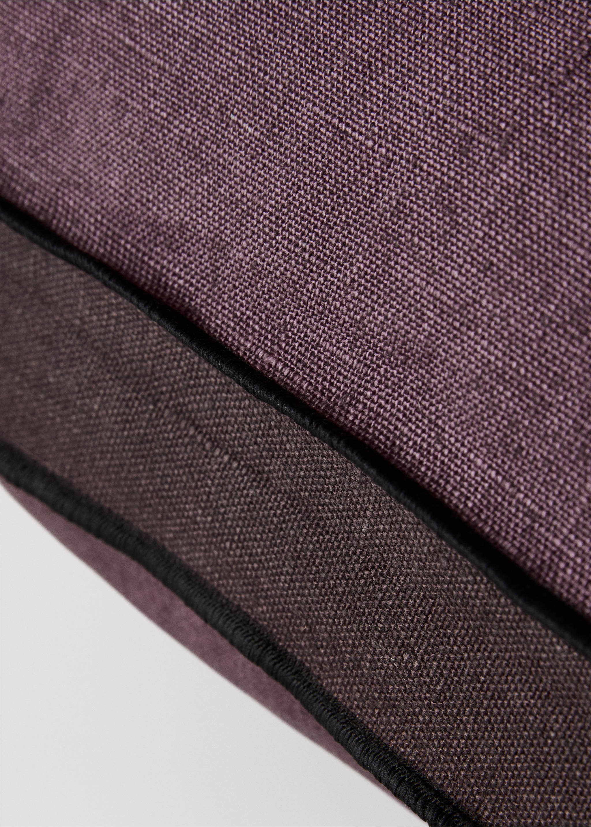 Purple cushion cover texture detail with black piping, Plum. Ref: 17003318-00.