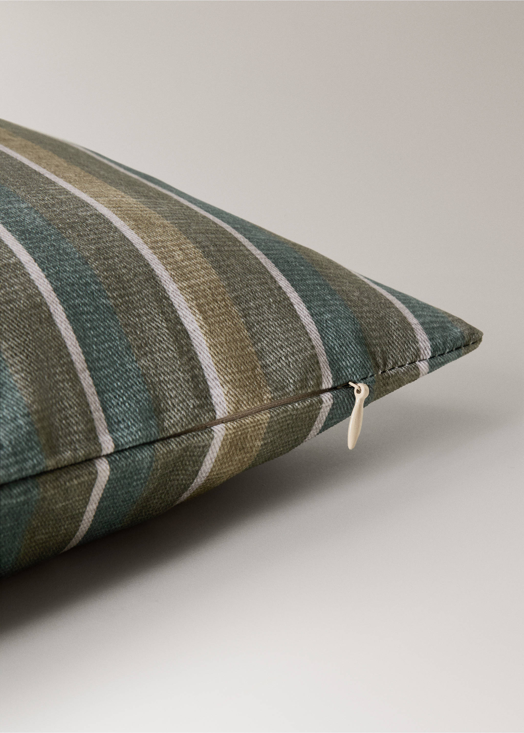 Close-up of a striped cushion cover with olive green, teal, and white stripes., Ink Blue. Ref: 17003354-00.