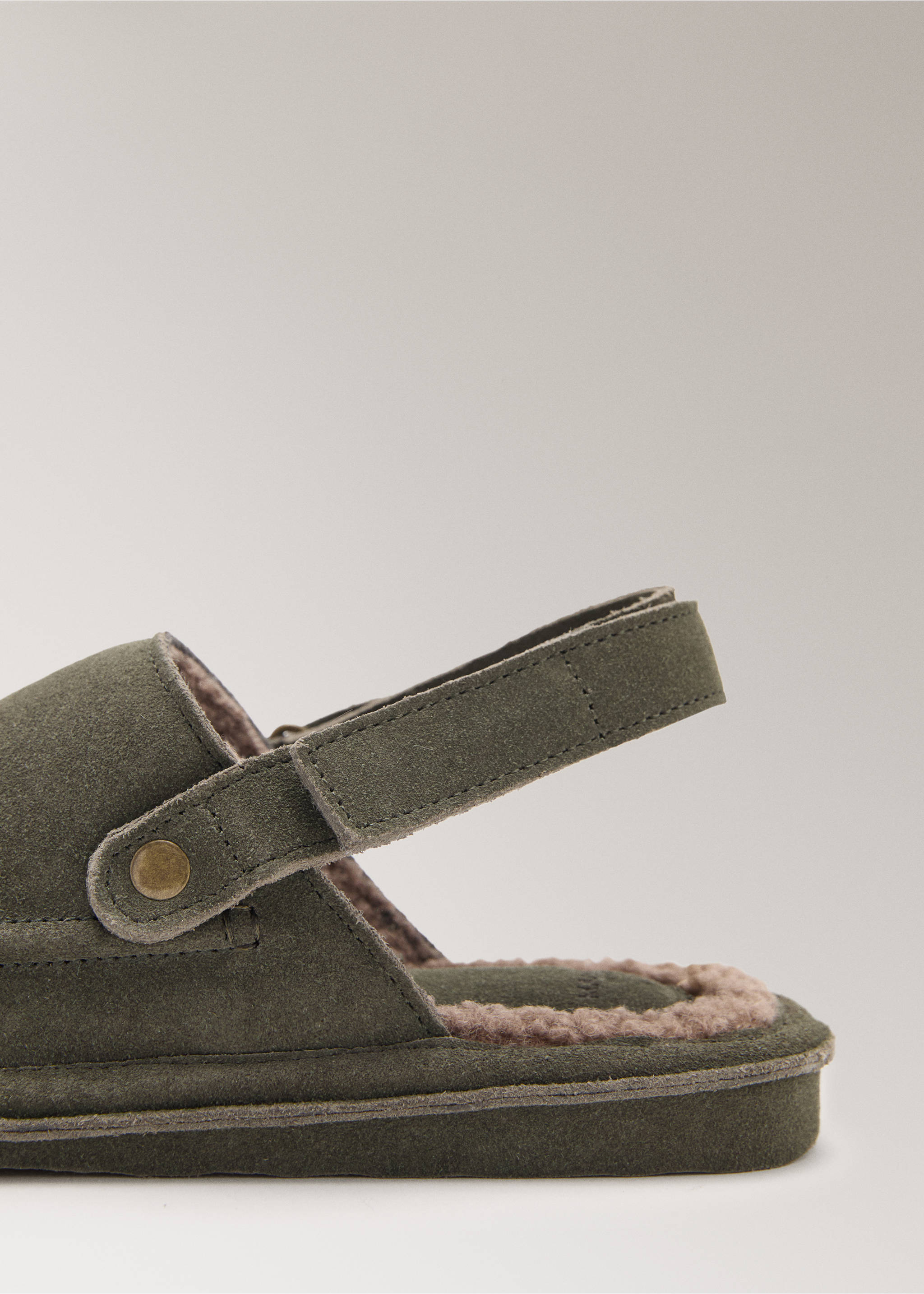 Close-up of olive green suede slippers with slingback strap and faux-fur lining., Pastel Green. Ref: 17004110-00.