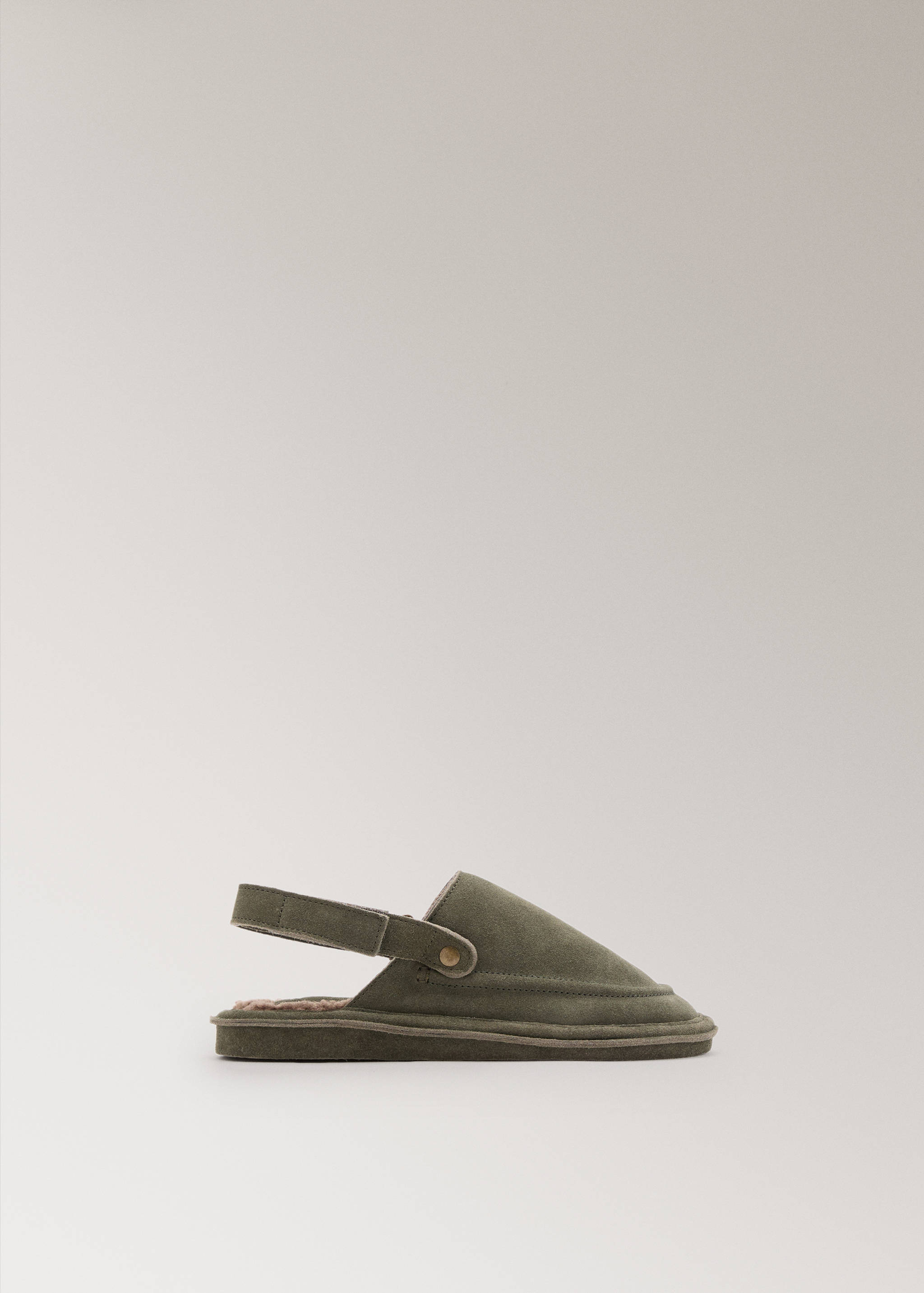 Khaki green suede slippers with slingback straps and faux-fur lining.