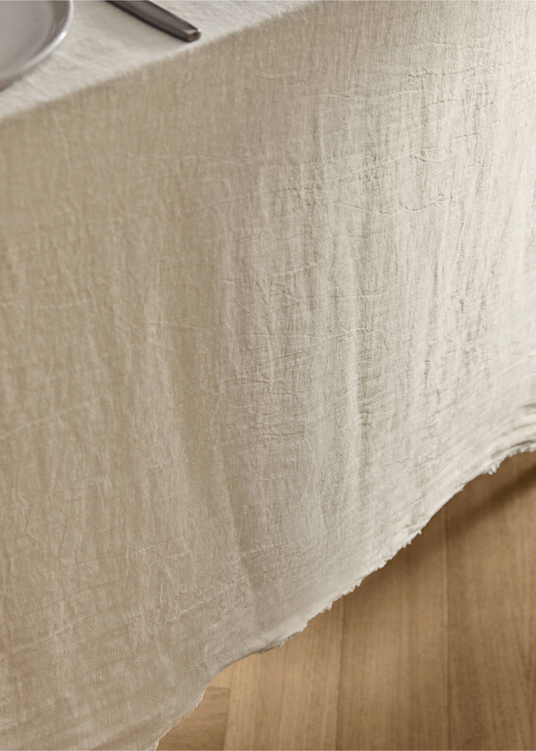 Beige textured linen tablecloth with a raw fringed edge., Off White. Ref: 17004150-00.