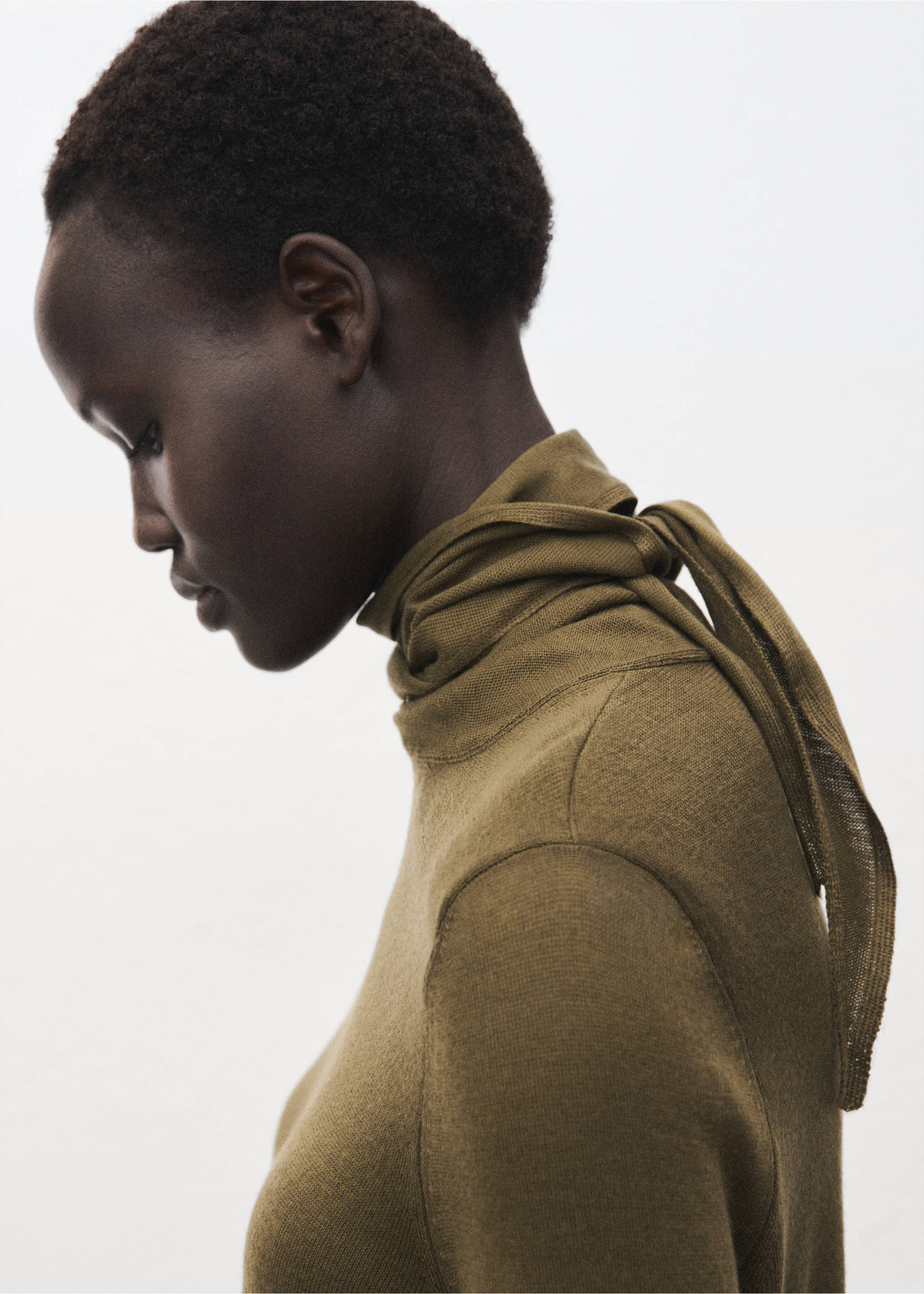 Turtleneck sweater with knot - Details of the article 1, Olive Green. Ref: 17005837-00.