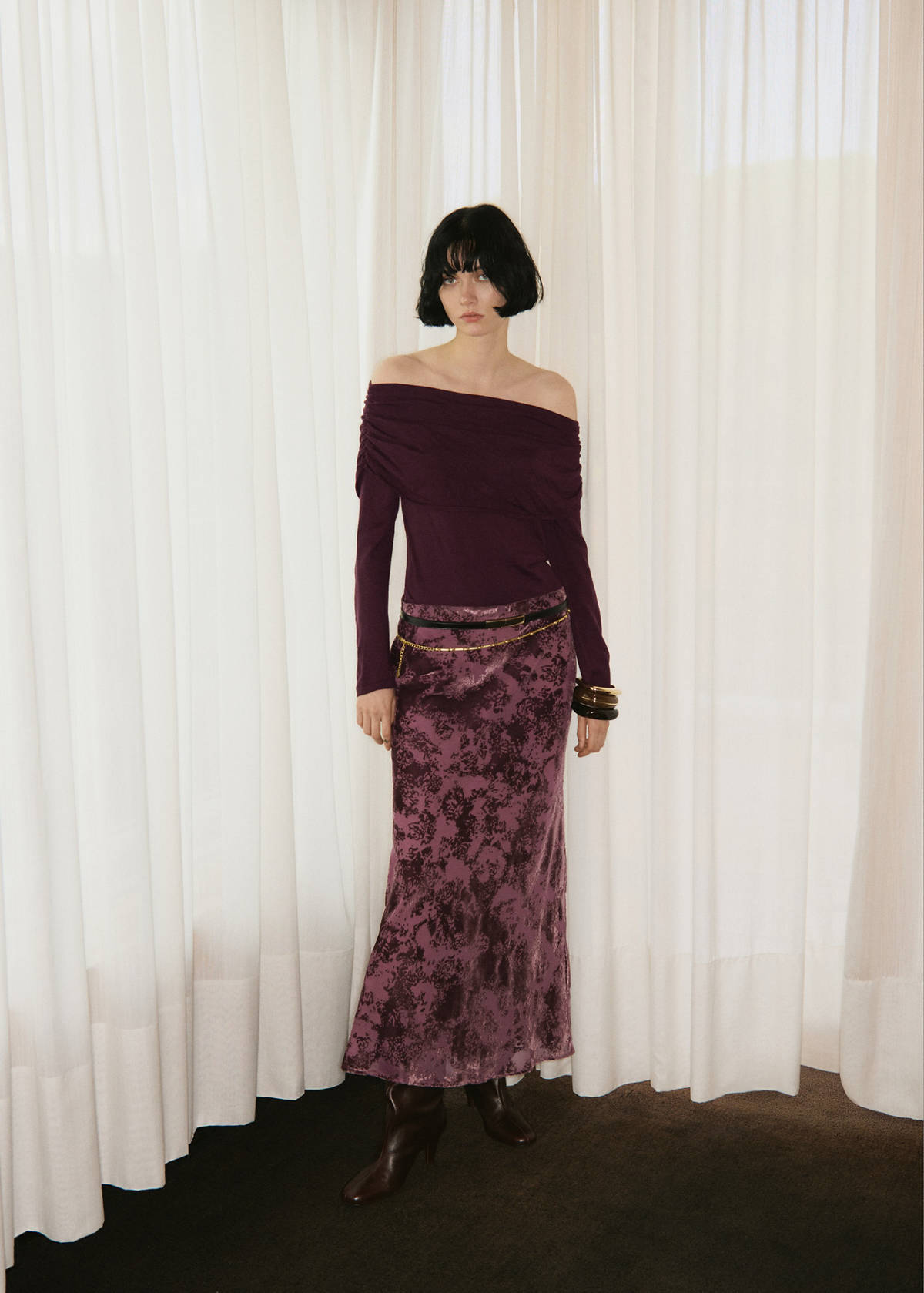 Fitted sweater with draped neckline