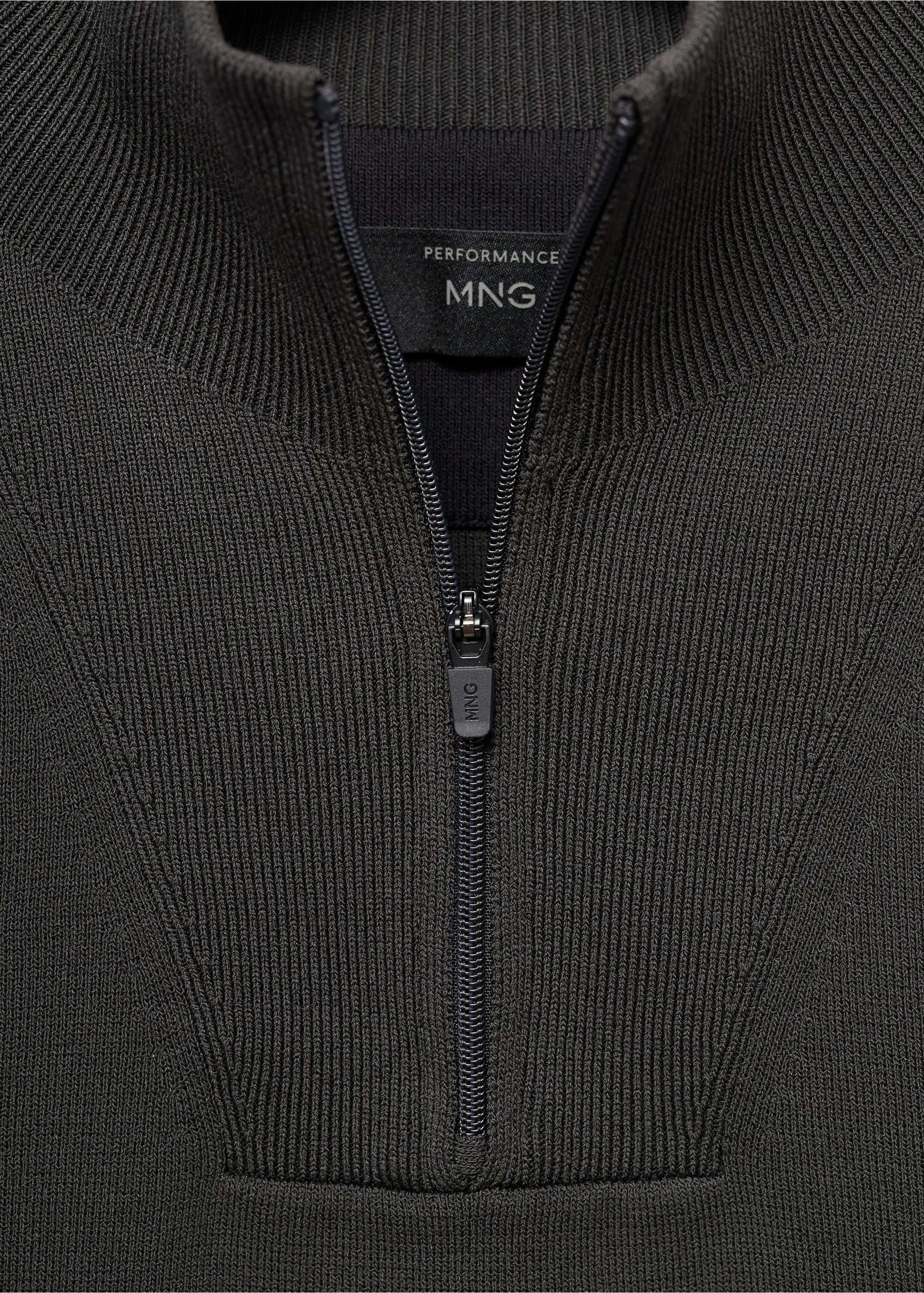 Close-up of a dark grey ribbed knit jersey with a high zipped neck., Dark Green. Ref: 17005979-00.