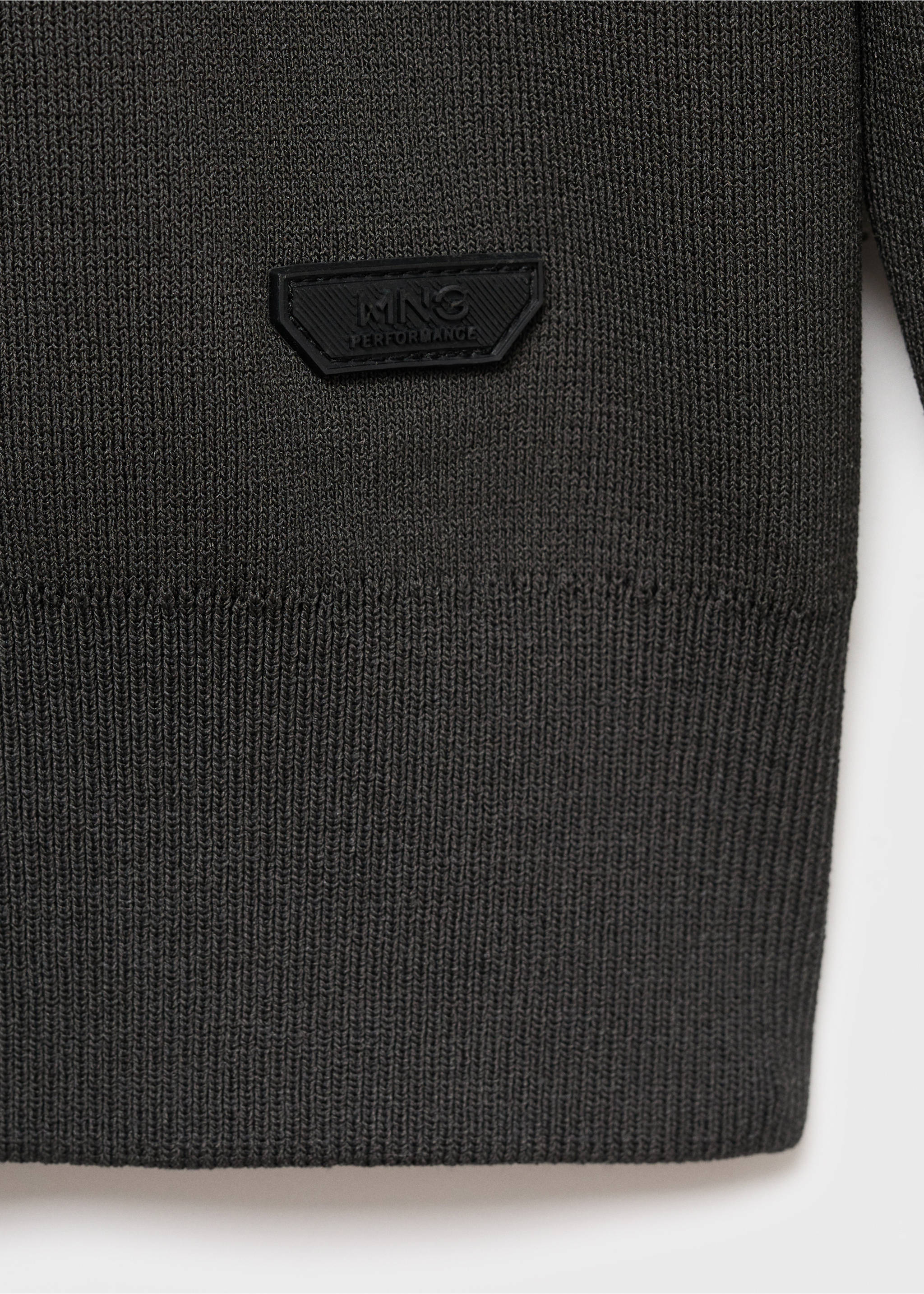 Dark grey knitted jersey fabric detail with ribbed hem and logo patch., Dark Green. Ref: 17005979-00.