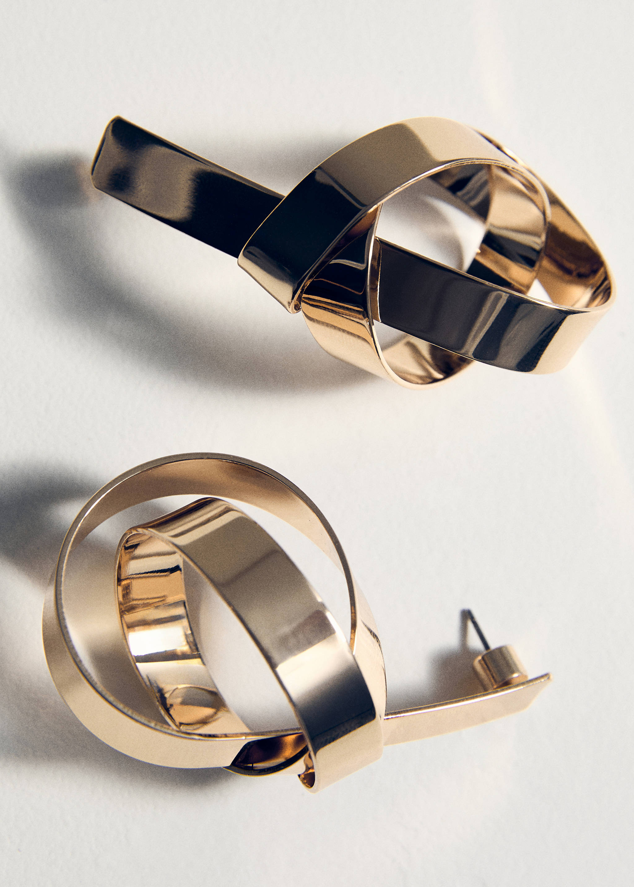 Verschlungene Knoten-Ohrringe - Detail des Artikels 5