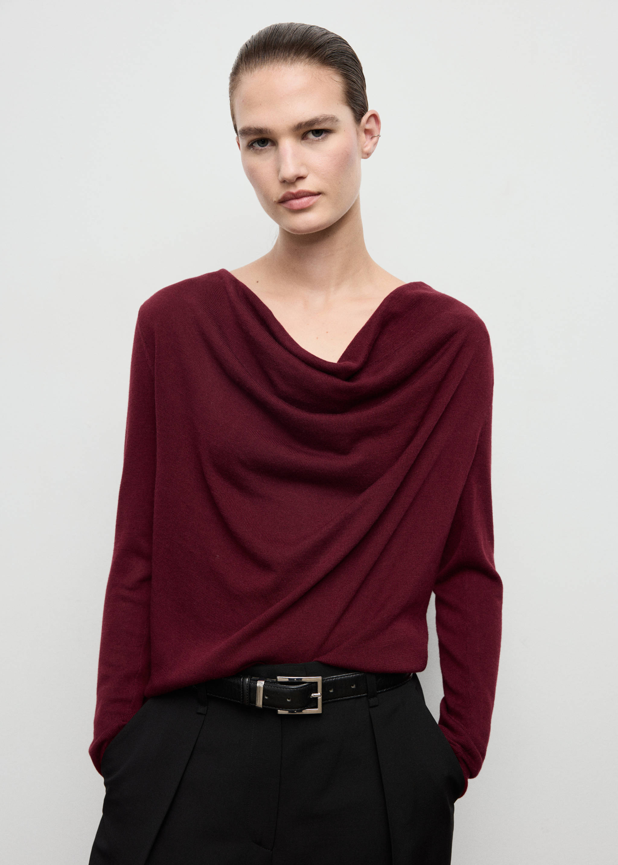 Burgundy long-sleeved jersey with a draped cowl neckline and relaxed fit.