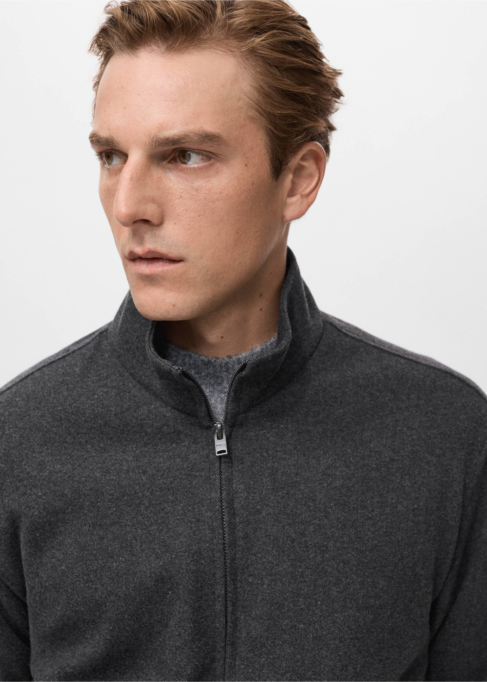 Dark grey zipped sweatshirt with a high collar on a model, close-up view., Dark Heather Grey. Ref: 17007903-00.