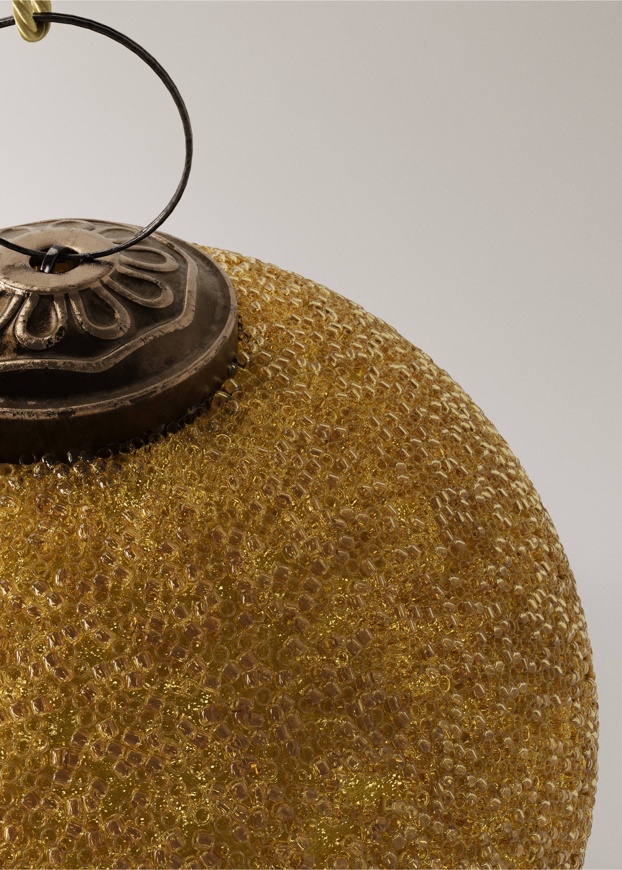 Close-up of a gold beaded Christmas bauble with a bronze cap., Gold. Ref: 17008640-00.