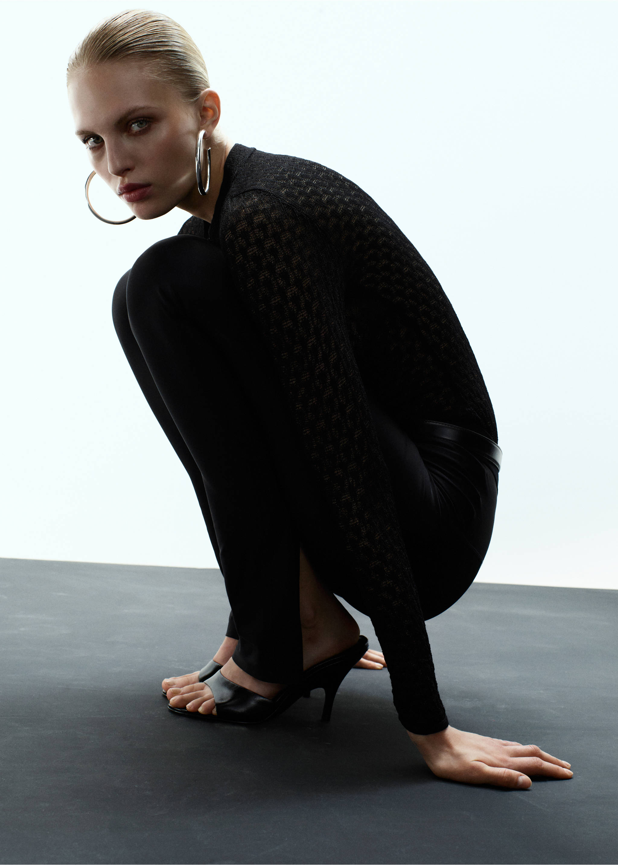 Black openwork knit jersey with long sleeves and a fitted silhouette., Black. Ref: 17009133-00.