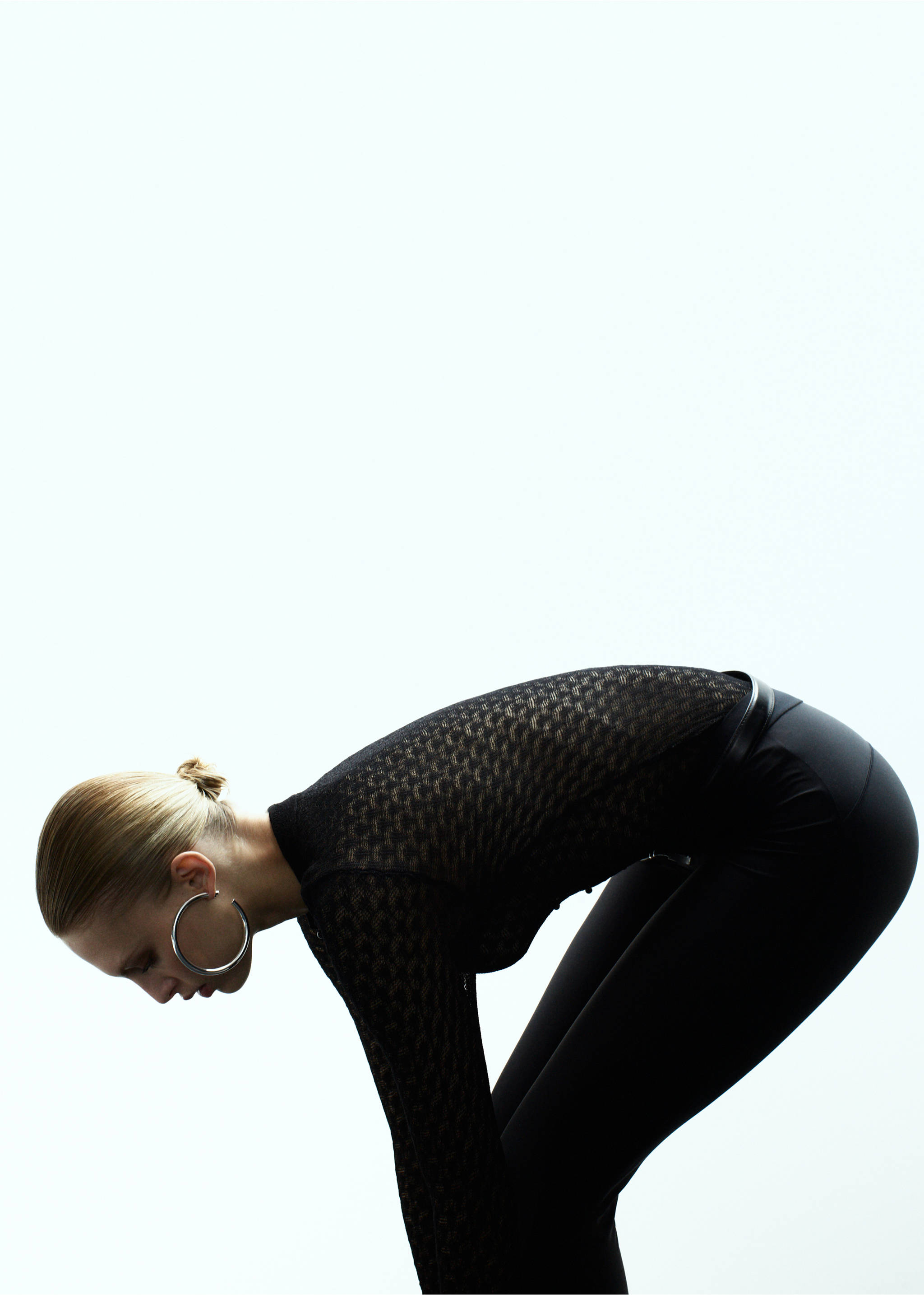 Black open-work knitted jersey with a fitted silhouette and long sleeves., Black. Ref: 17009133-00.