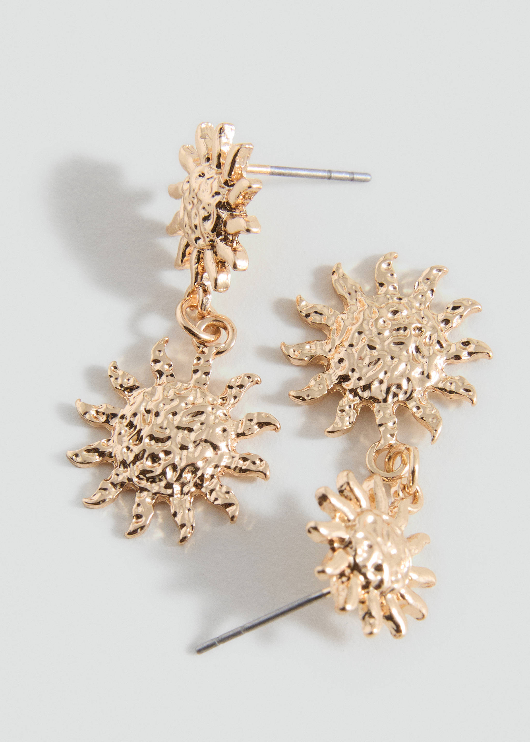 Orecchini design sole - Piano medio