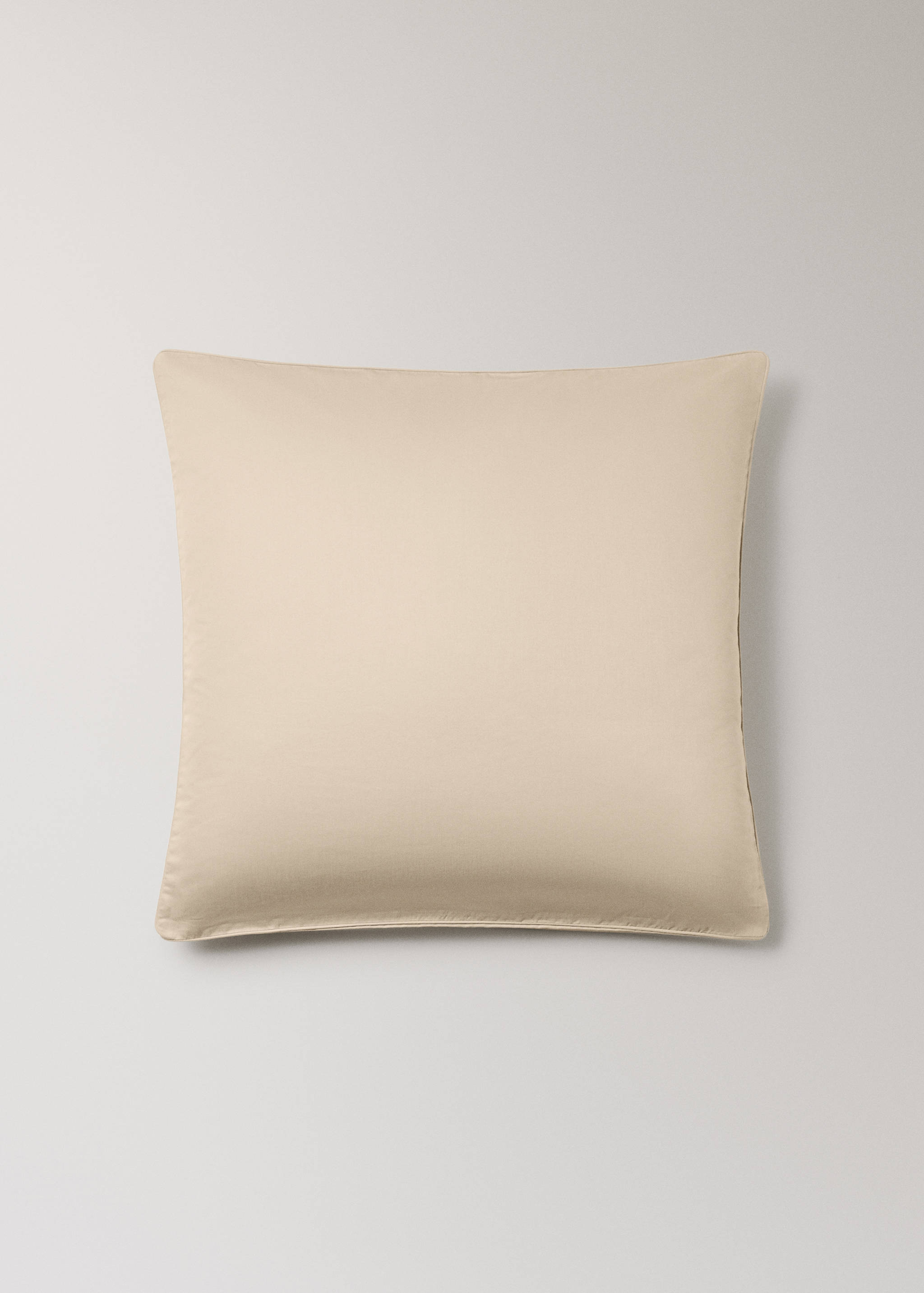Plain beige pillowcase.