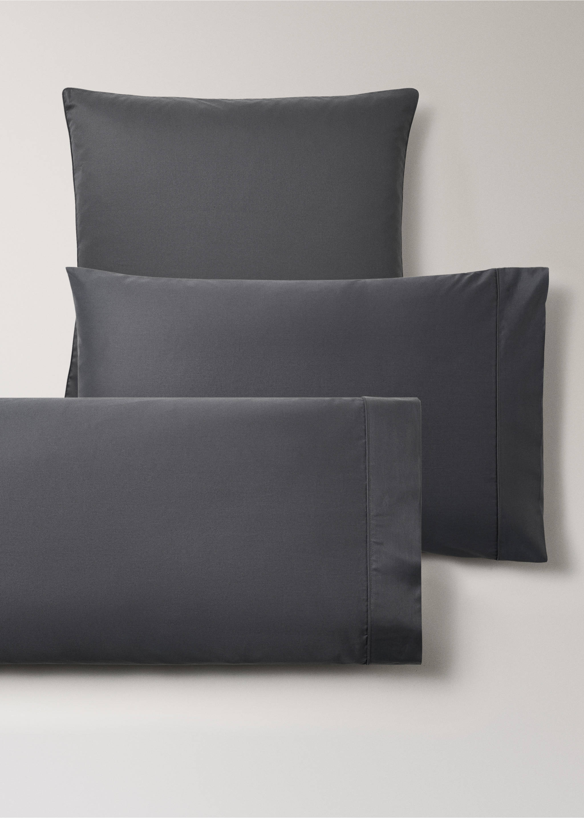 Dark grey cotton pillowcase with a stitched border detail., Dark Grey. Ref: 17011584-00.