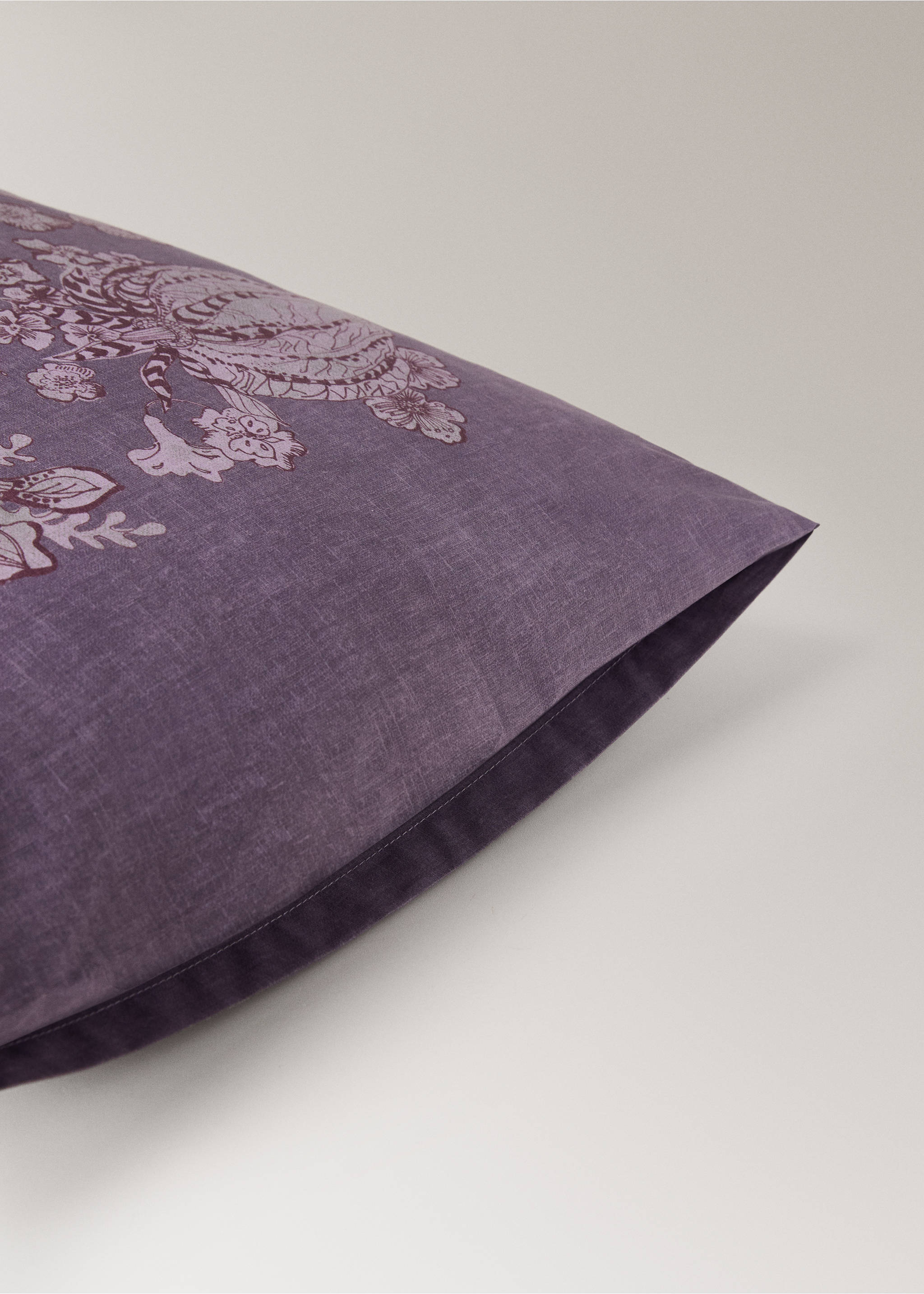 Purple pillowcase with a dark floral and animal print., Plum. Ref: 17011609-00.