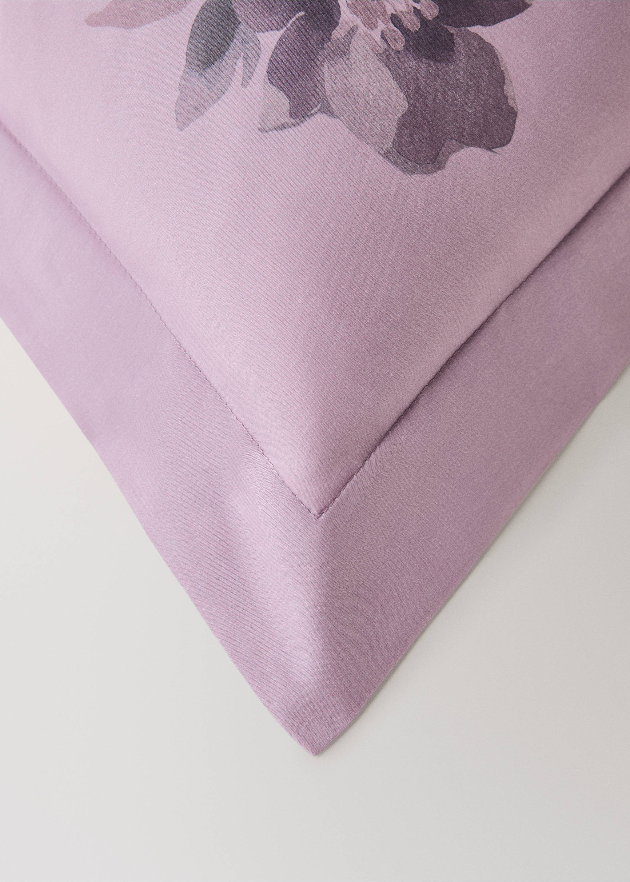 Lilac pillowcase with a tailored border and a dark purple floral print., Plum. Ref: 17011629-00.
