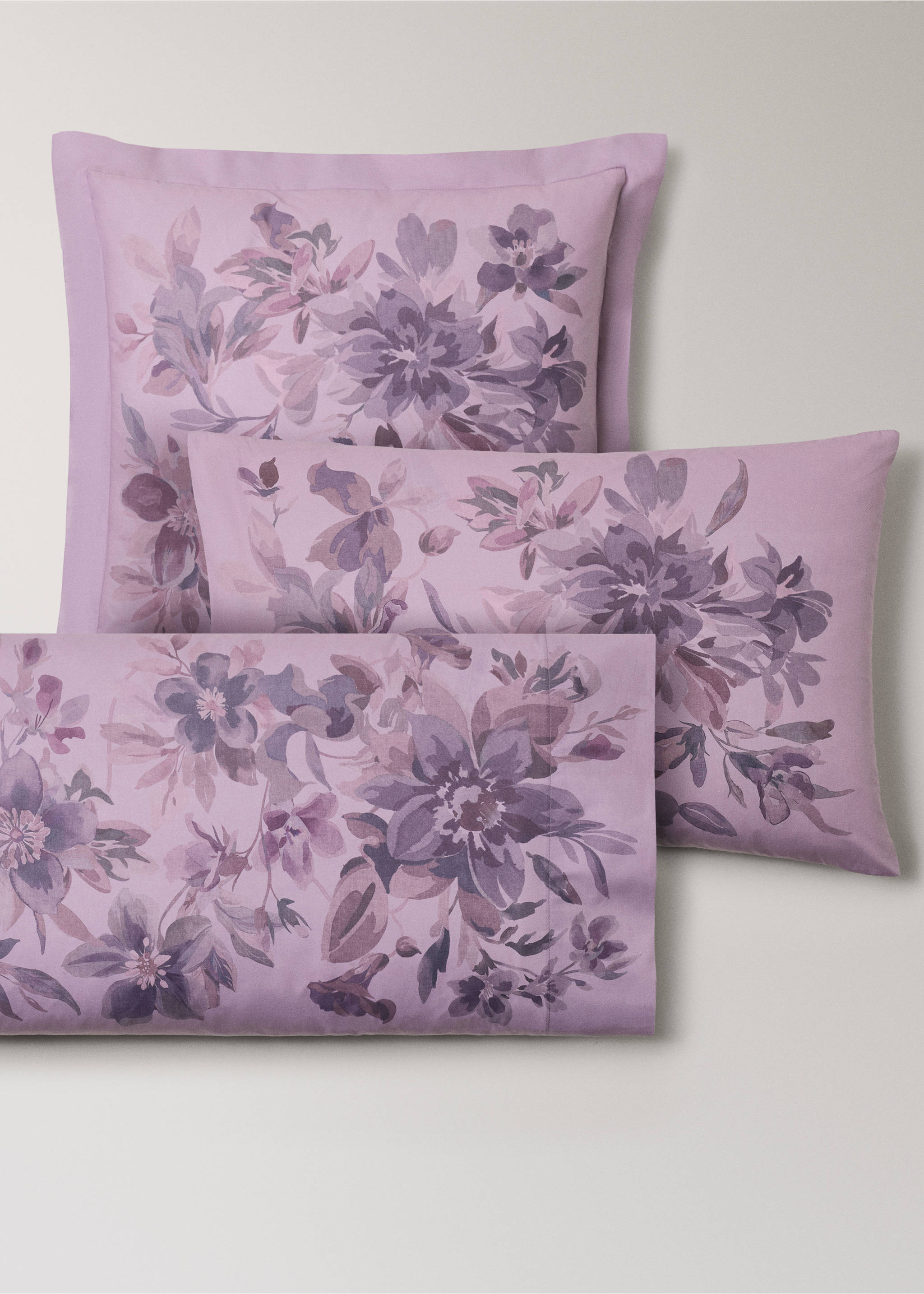 Purple floral-print pillowcases with a watercolor flower design., Plum. Ref: 17011629-00.