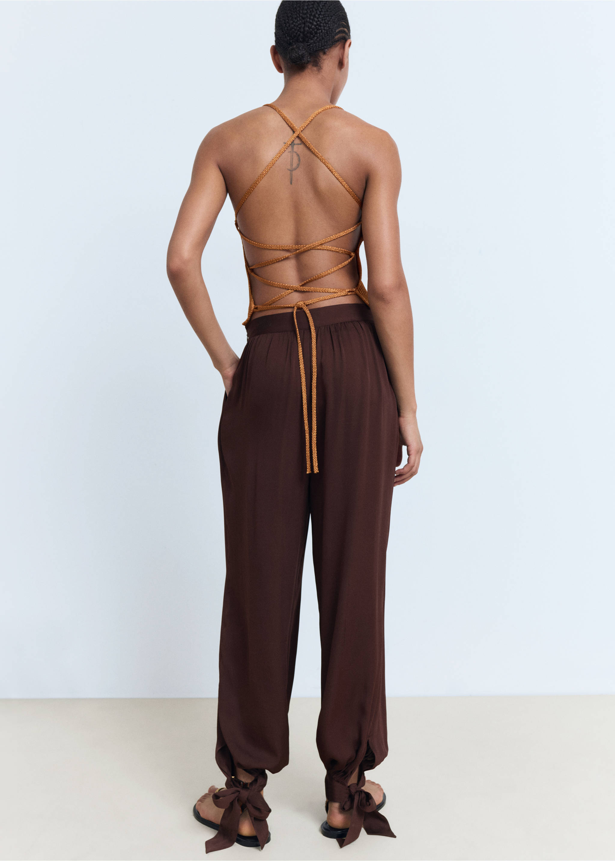 Balloon trousers with bows - Reverse of the article, Chocolate. Ref: 17012541-00.