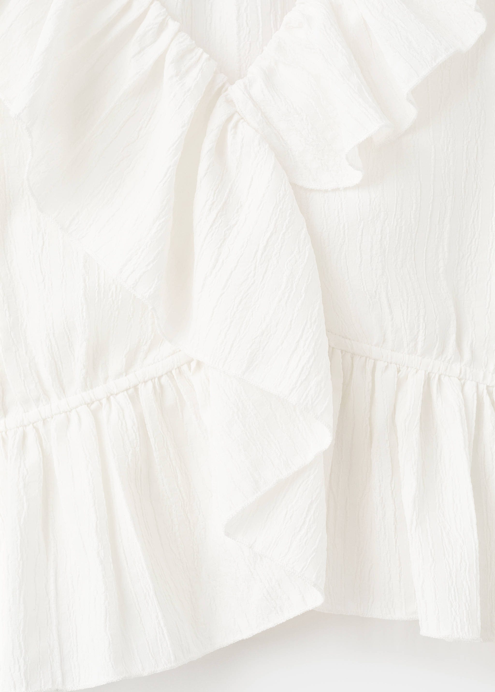 Volantbluse in Wickel-Optik - Detail des Artikels 8