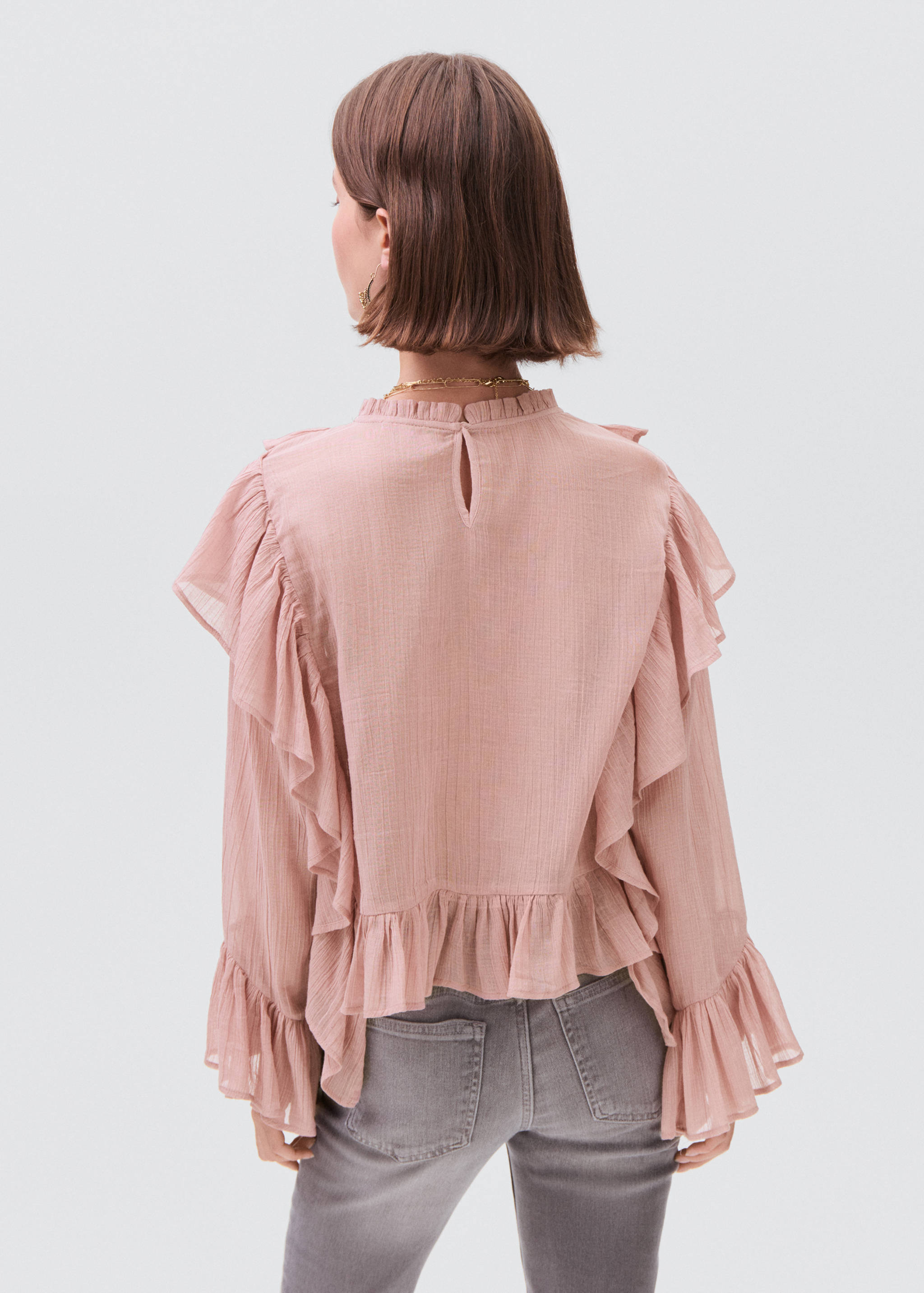 Ruffled blouse - Reverse of the article
