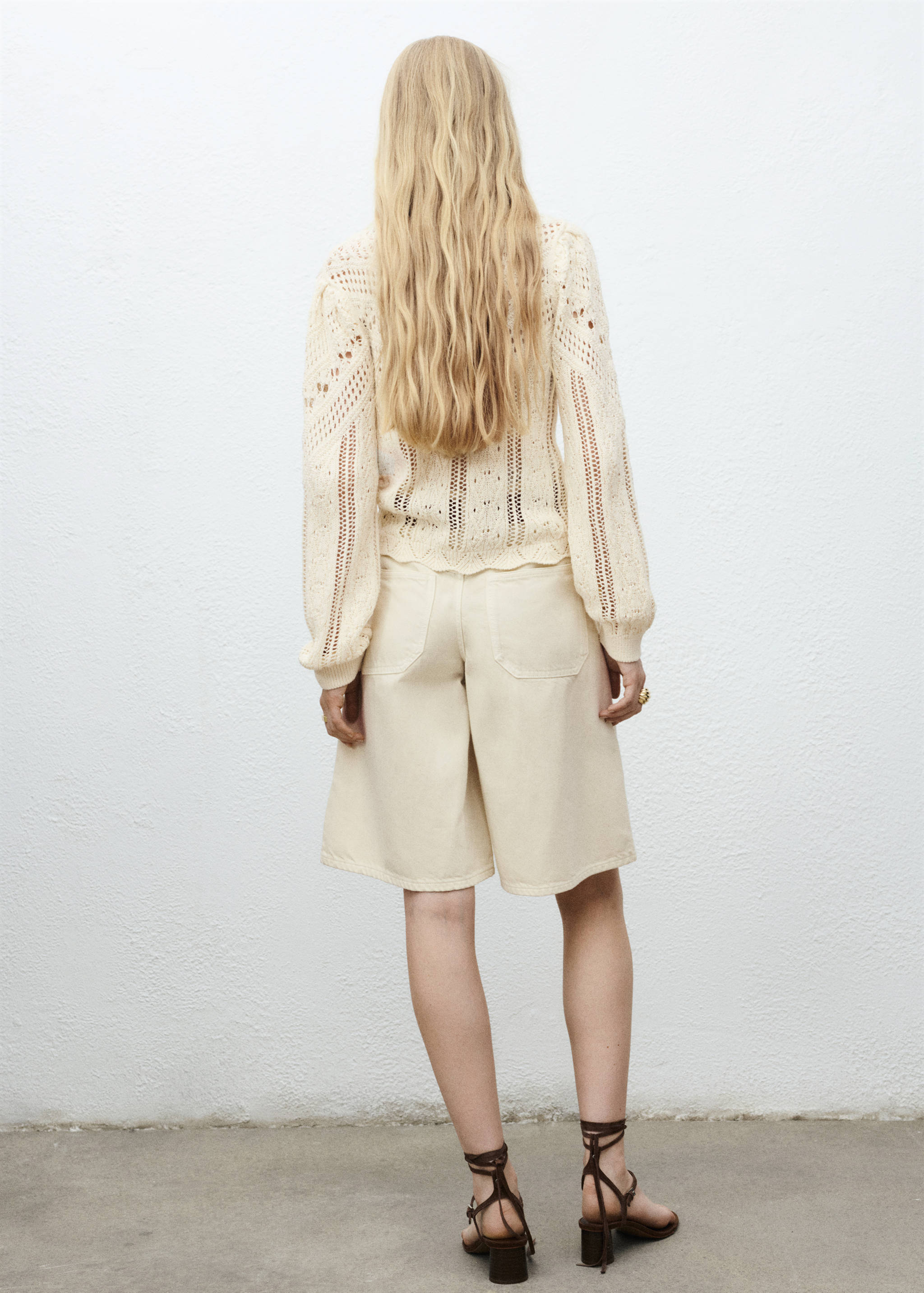 Knitted sweater with openwork details - Reverse of the article