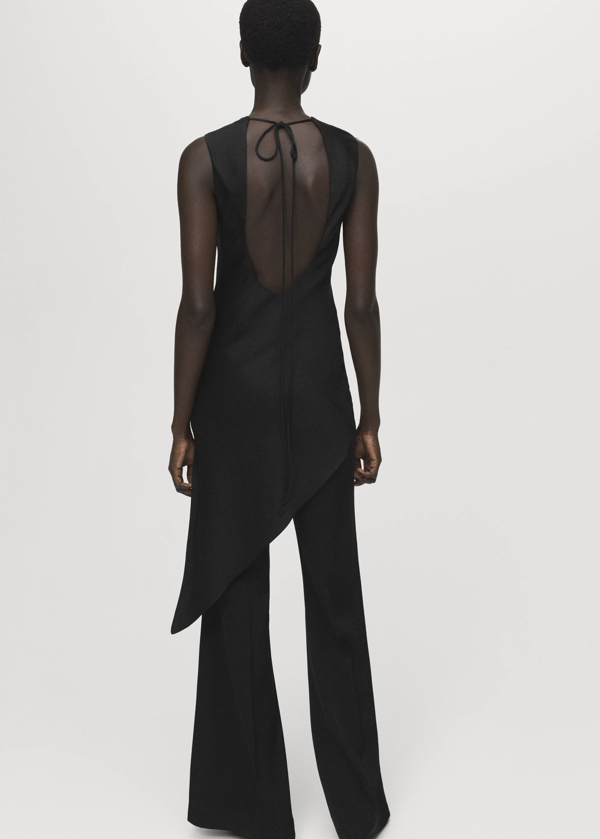 Long flared trousers - Reverse of the article
