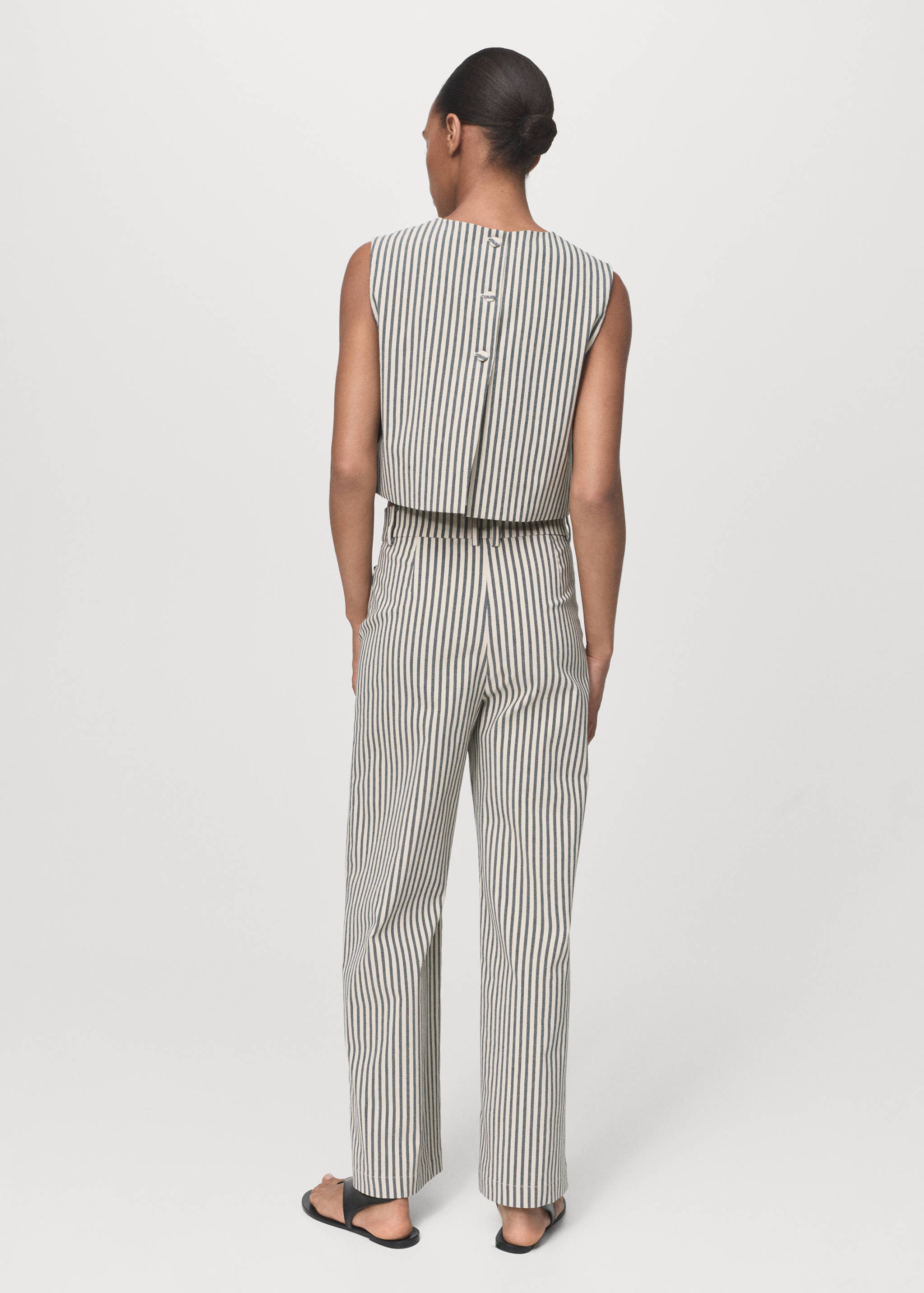 Striped trousers with pockets - Reverse of the article