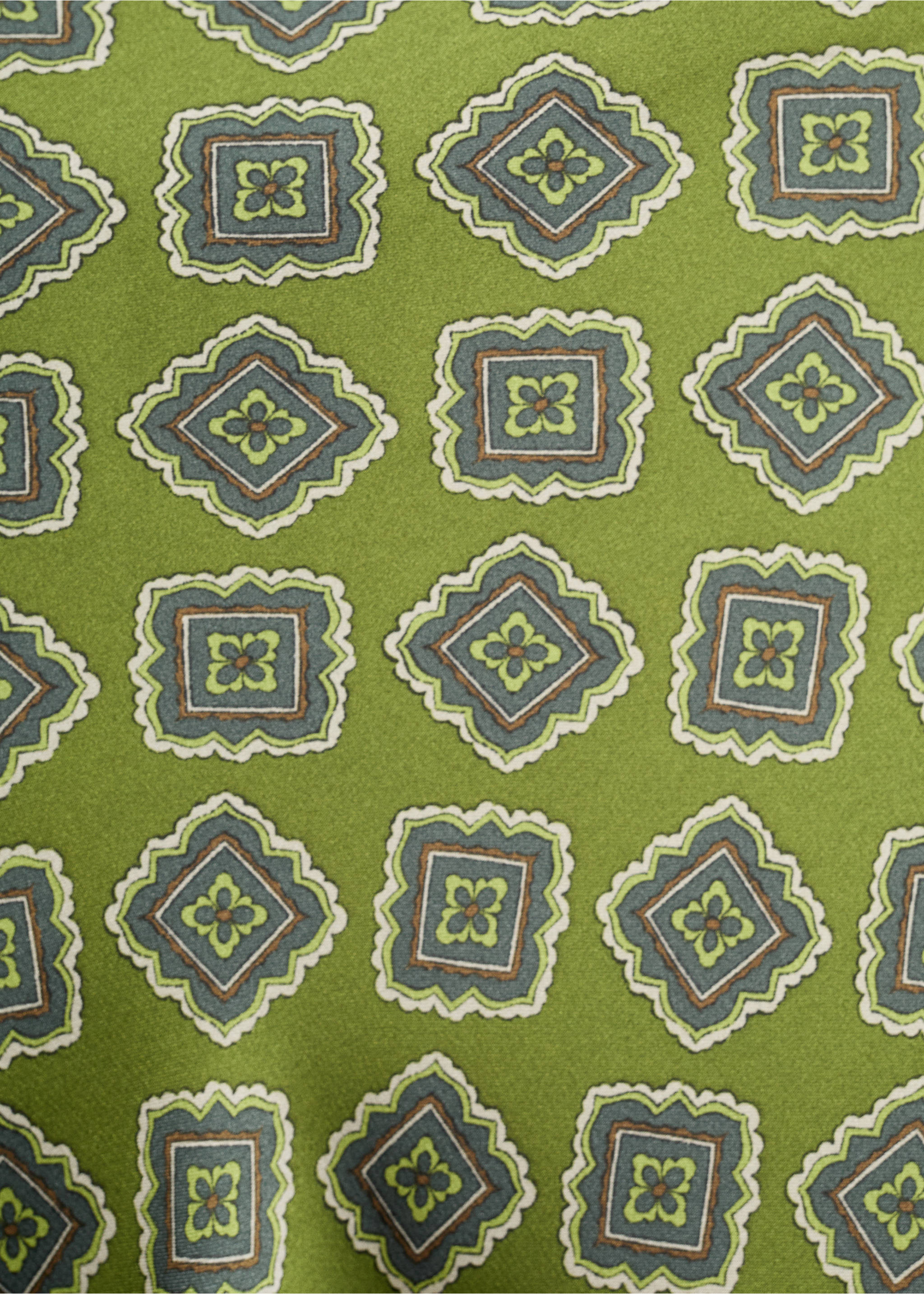 Green dress fabric with a geometric print., Green. Ref: 17015832-00.