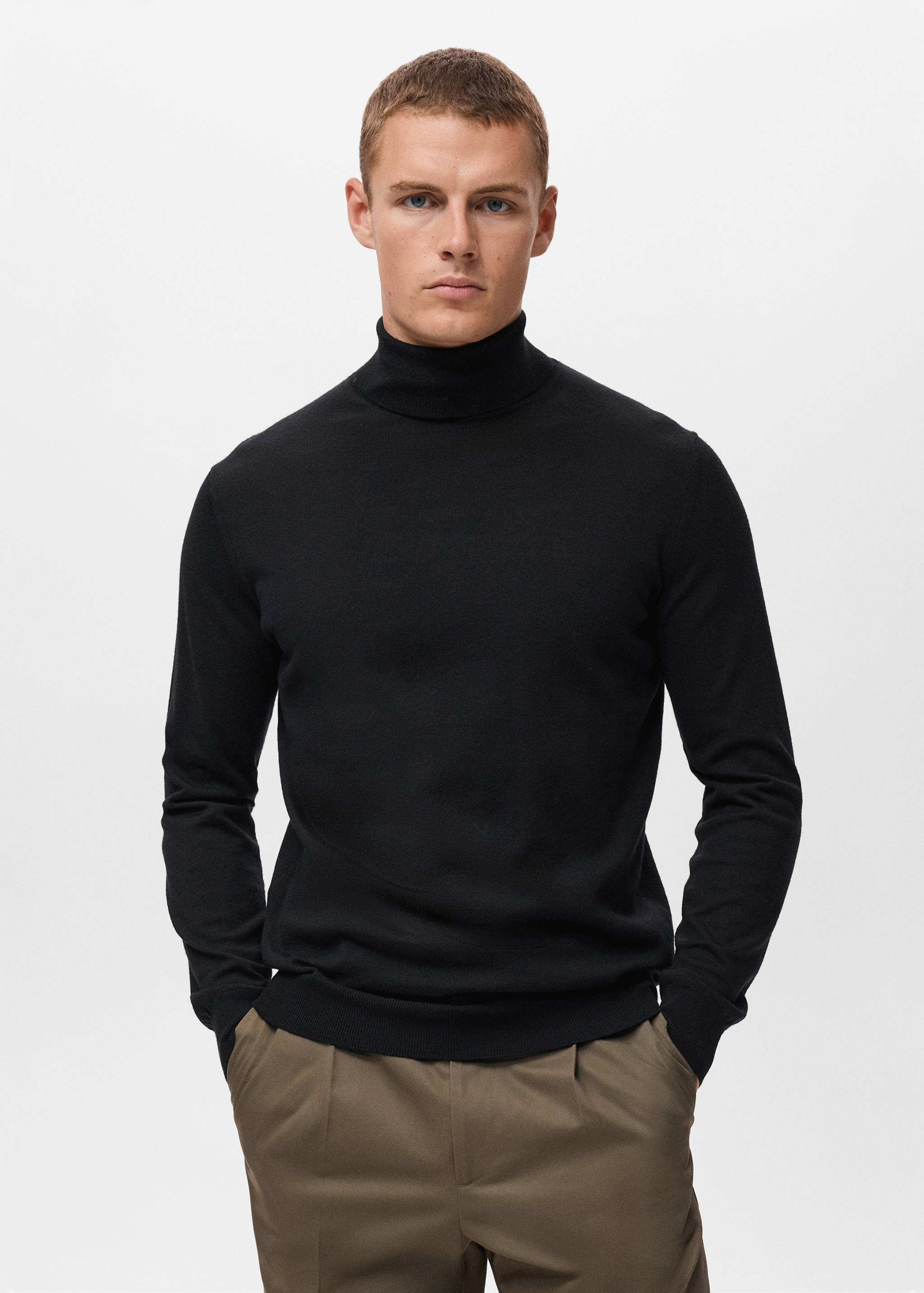 Black fine-knit roll-neck jersey with long sleeves.