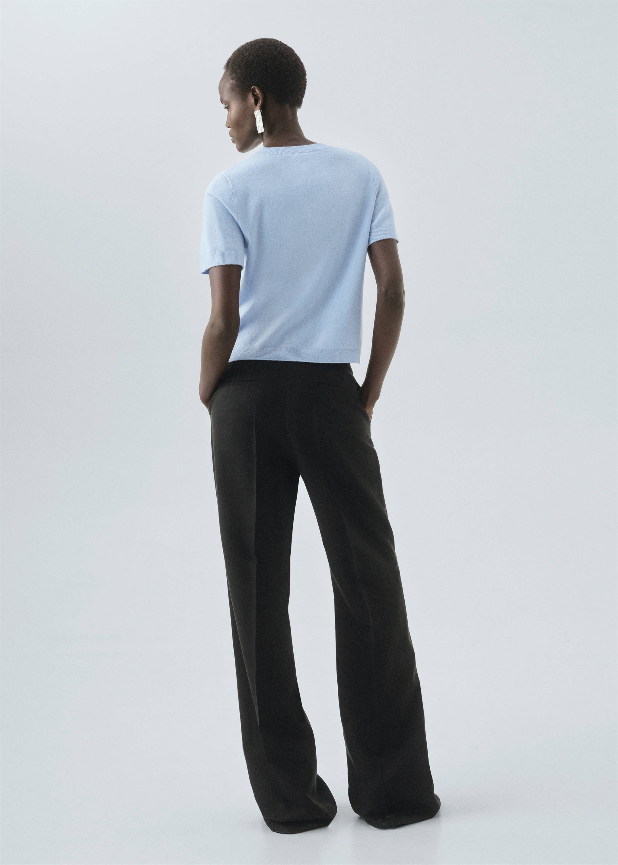 Short-sleeved wool sweater - Reverse of the article