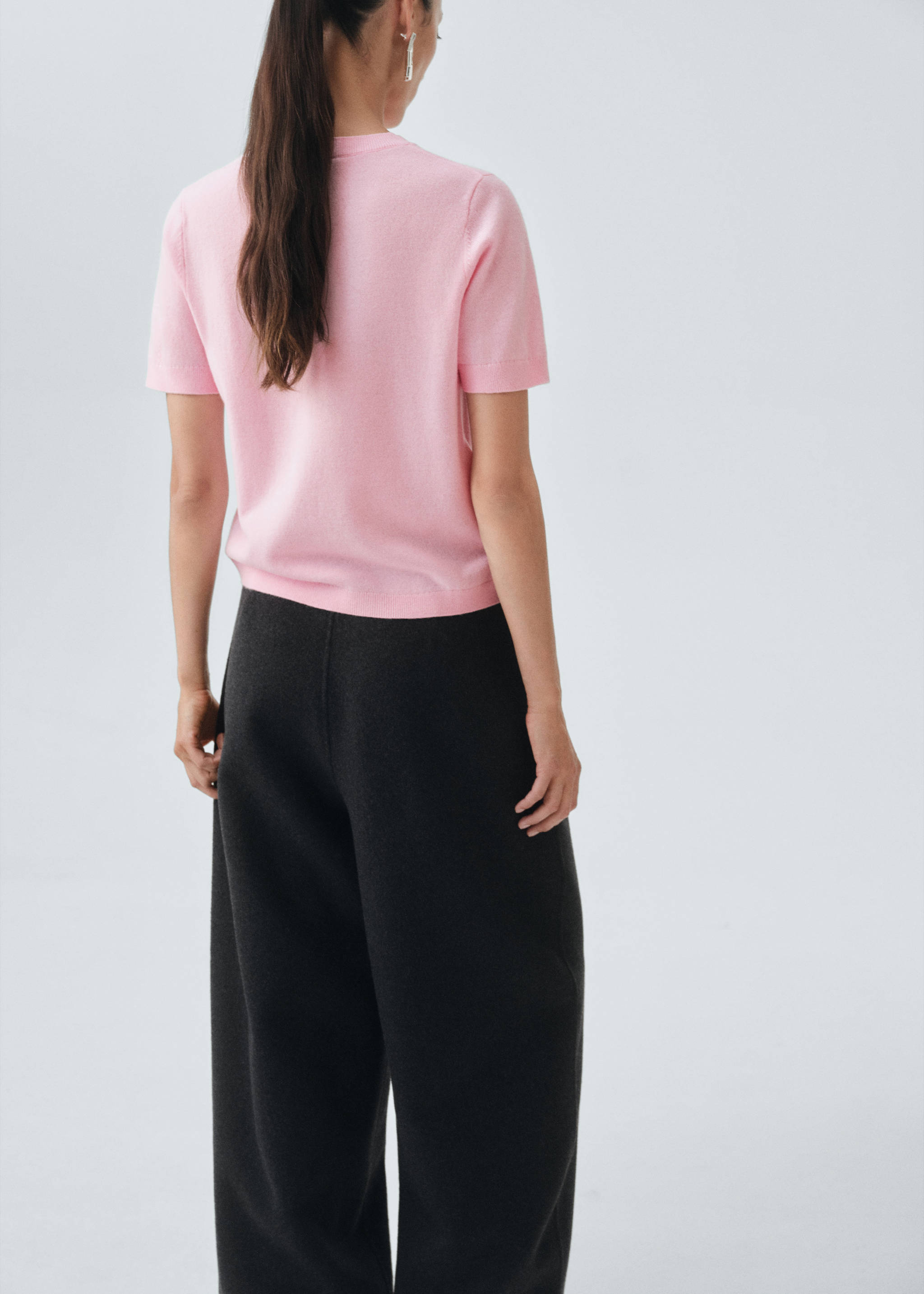 Short-sleeved wool sweater - Reverse of the article