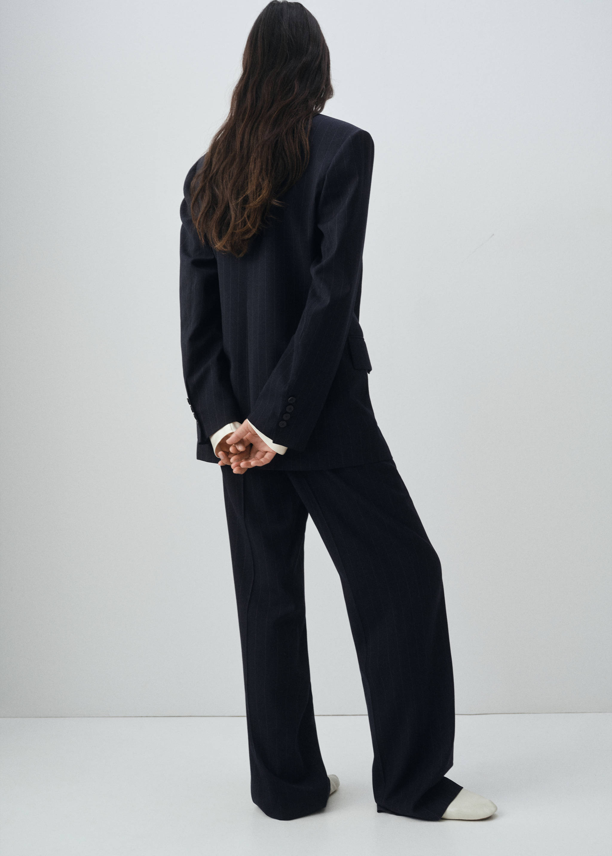 Double-breasted pinstripe suit jacket - Reverse of the article