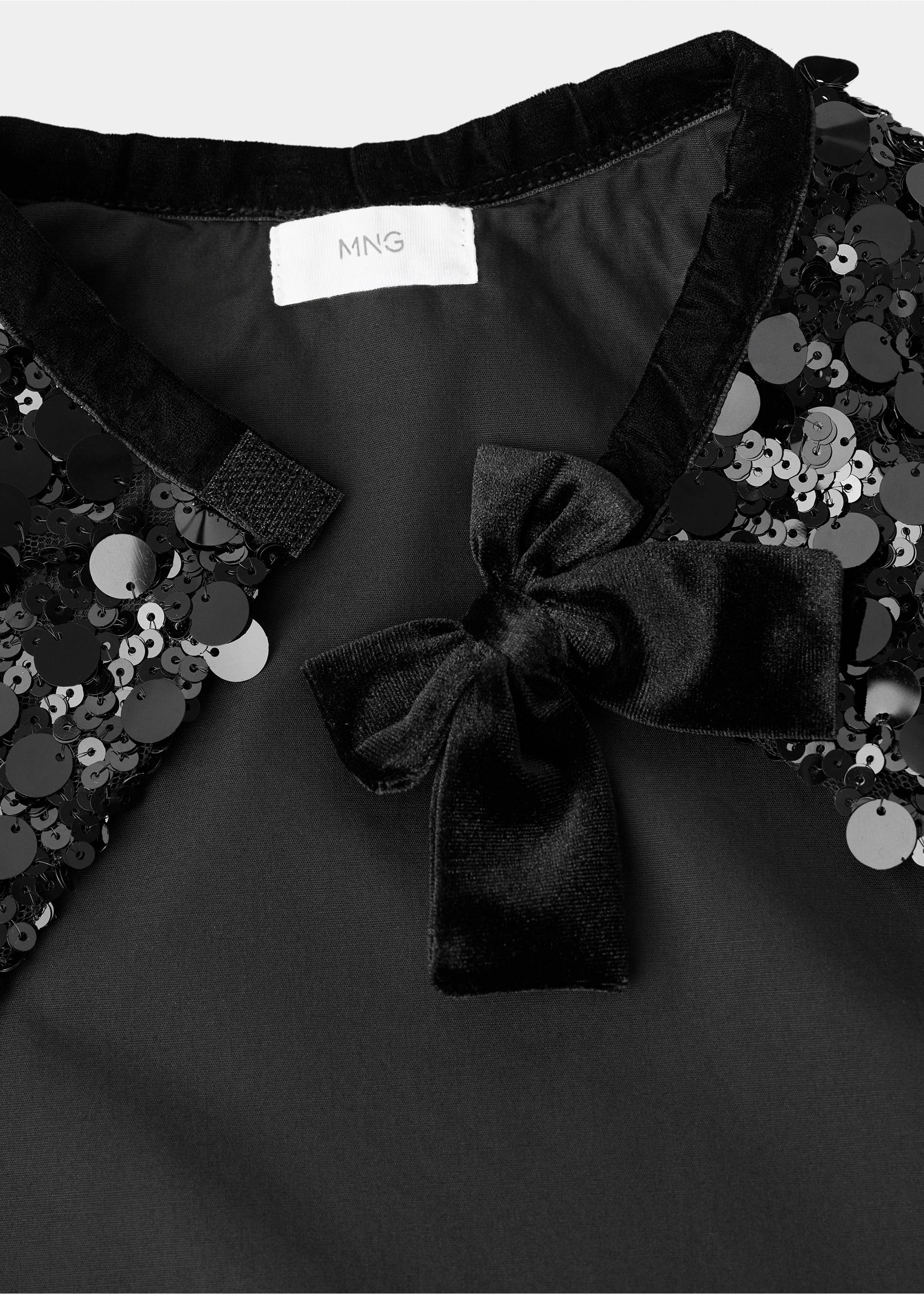 Sequin cape with ribbon bow - Details of the article 2, Black. Ref: 17017134-00.