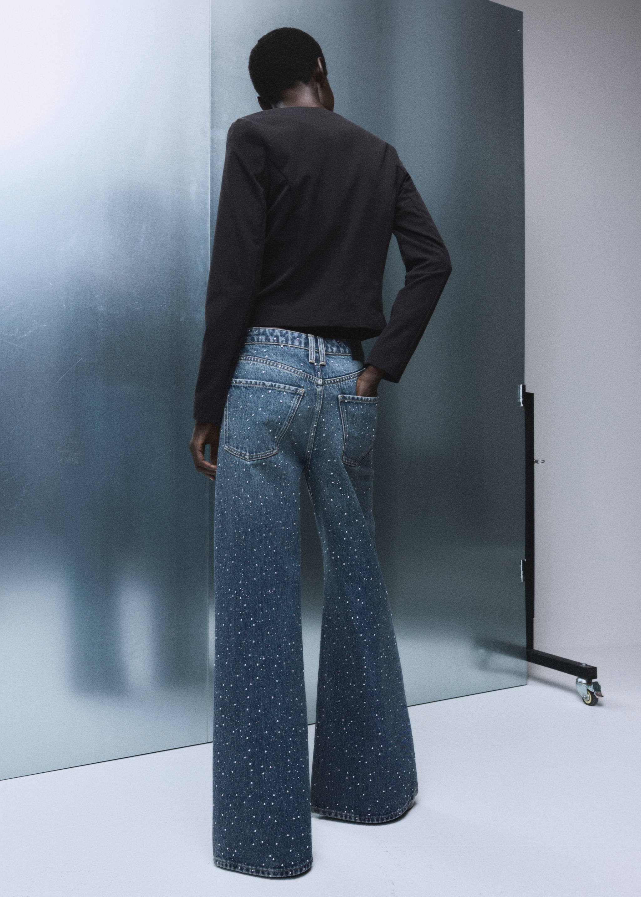 Wide leg jeans with rhinestones - Reverse of the article