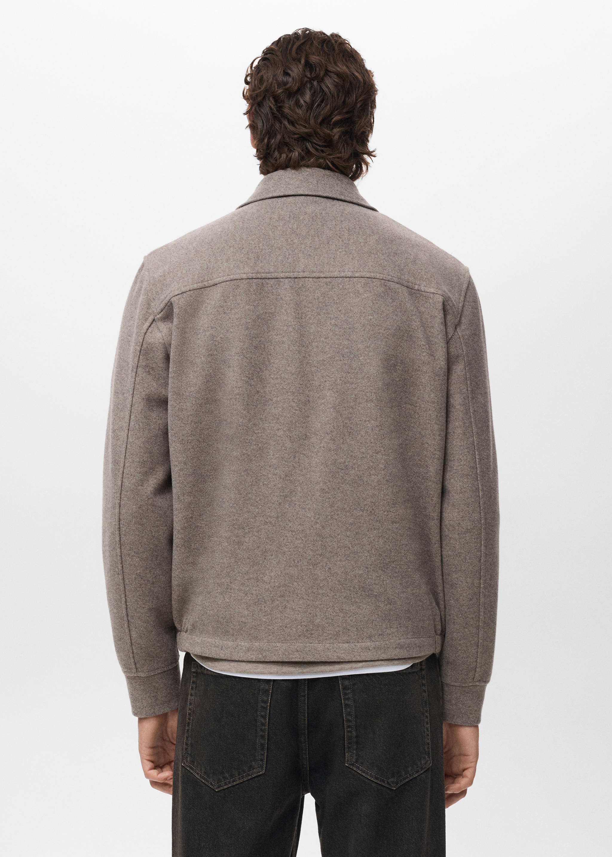 Zip-up cloth jacket - Reverse of the article