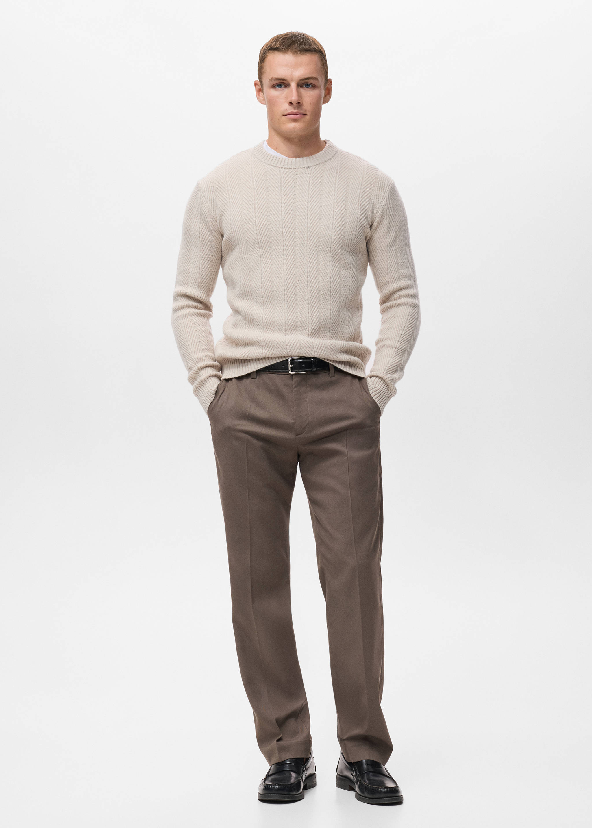 Cream textured knit jersey with crew neck and long sleeves.