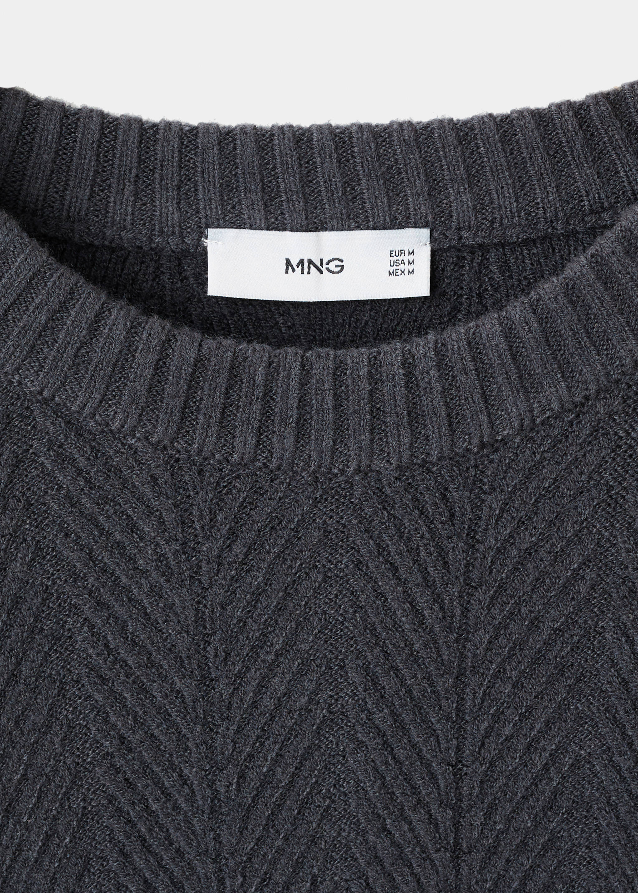 Close-up of a dark grey knit jumper's ribbed crew neckline and label.