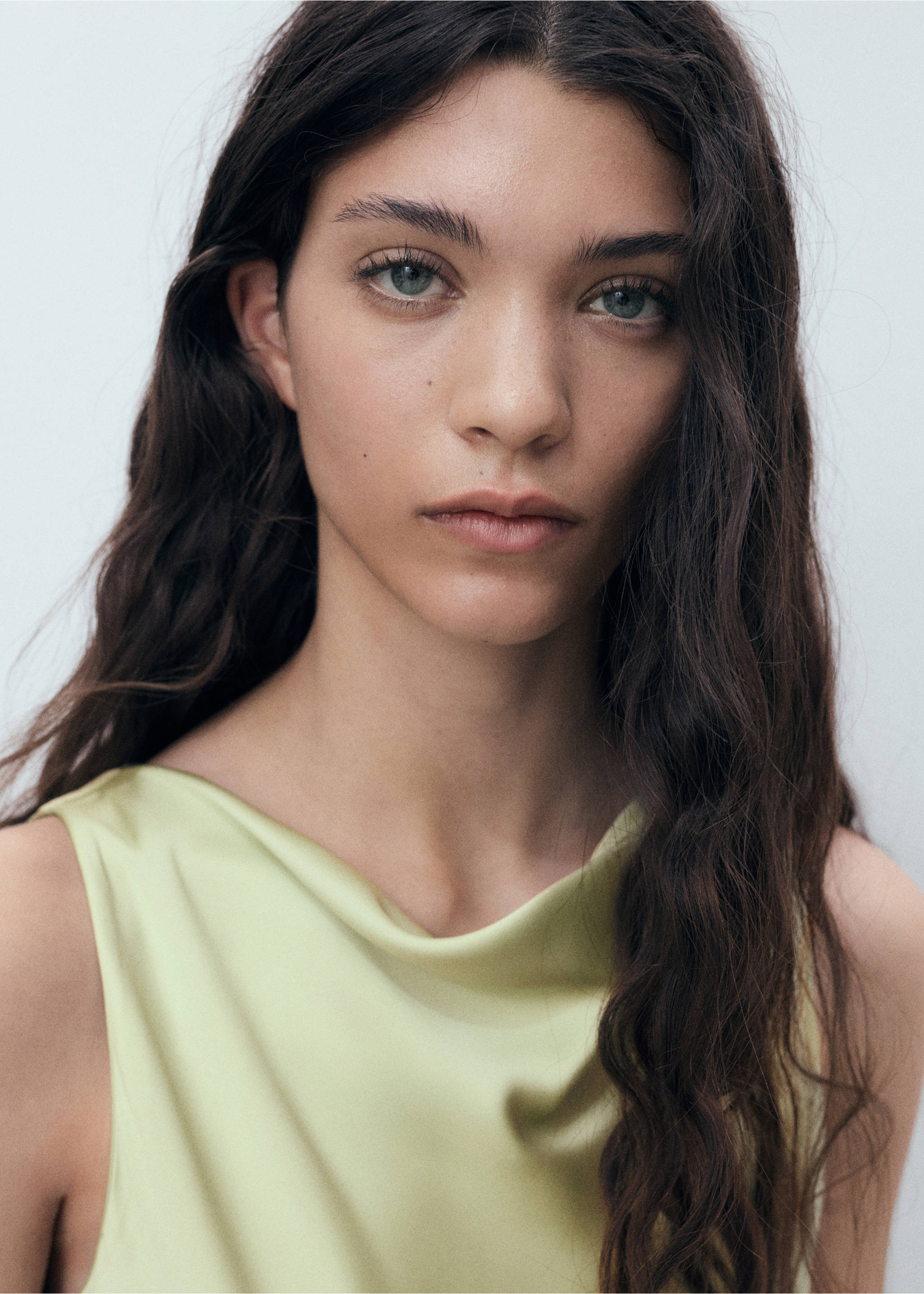 Combined dress with asymmetrical cut - Details of the article 1, Green. Ref: 17021127-00.