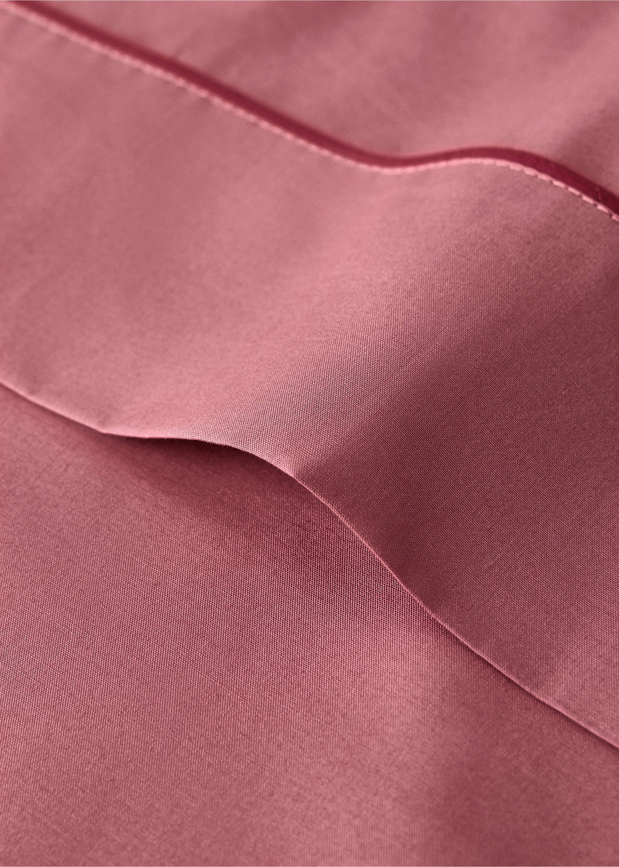 Pink flat sheet detail with a contrasting piped trim., Pink. Ref: 17021586-00.