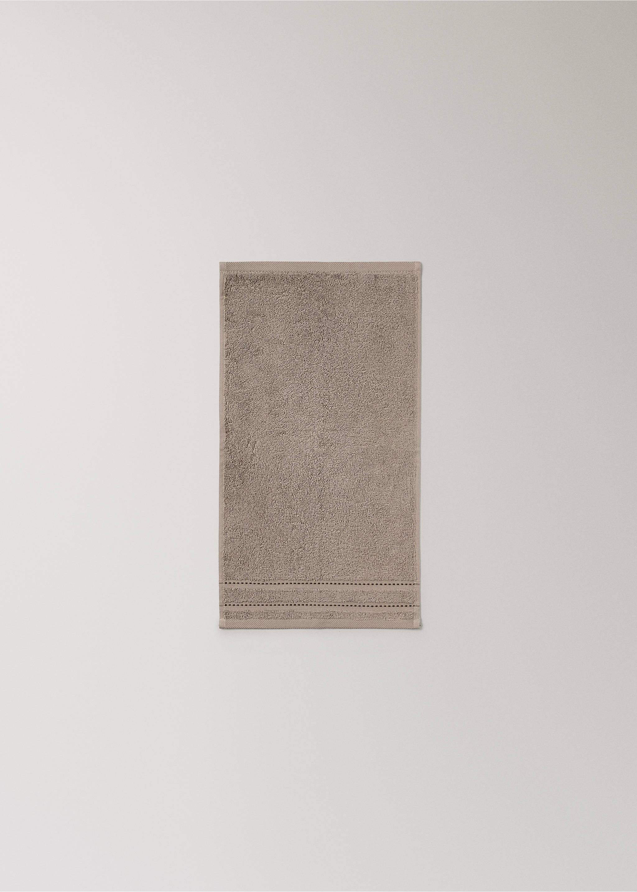 Cotton guest towel with embroidered dots - Details of the article 3, Medium Brown. Ref: 17021605-00.