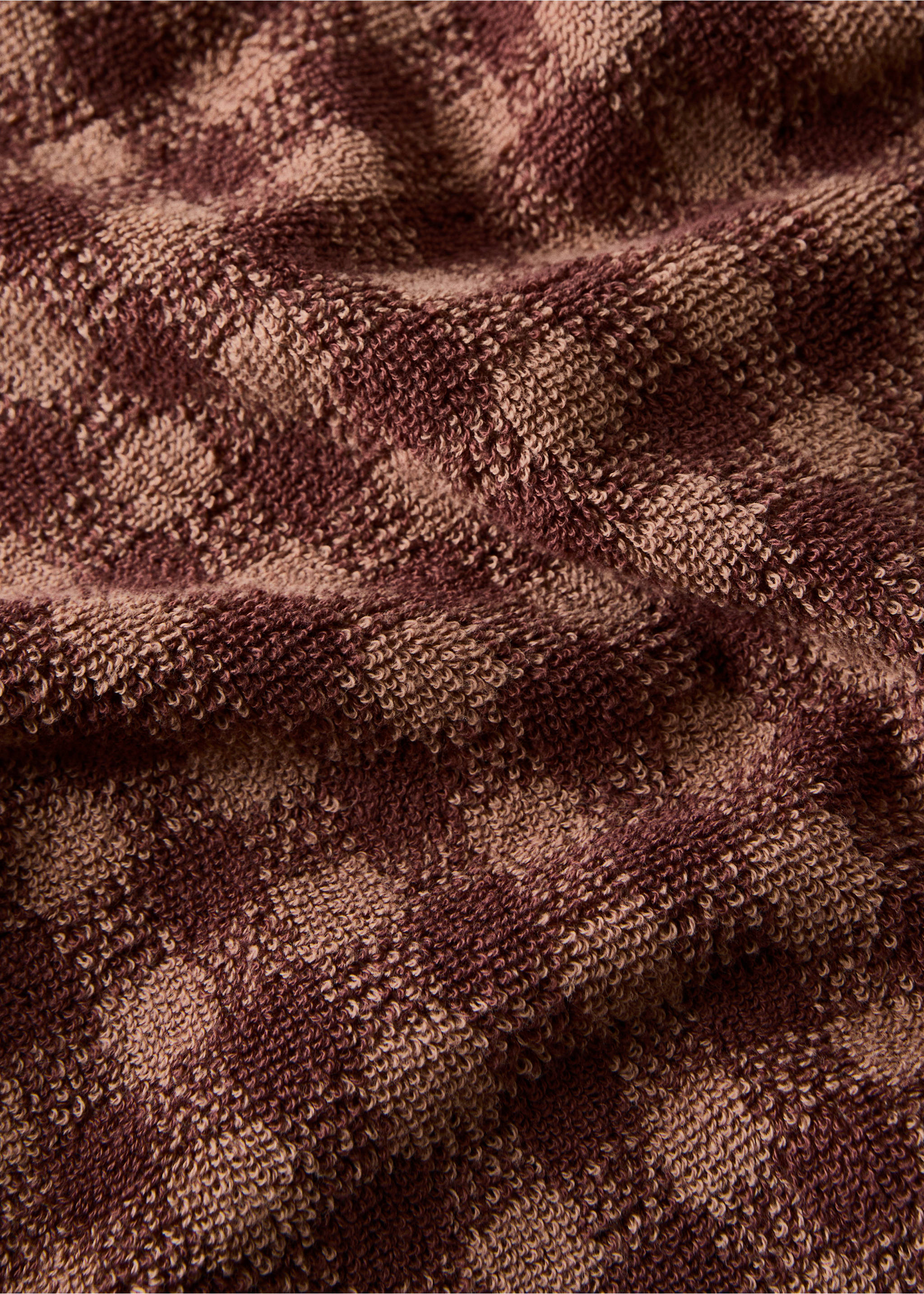 Cotton check-print guest towel with overlock stitching - Details of the article 1, Burnt Orange. Ref: 17021614-00.