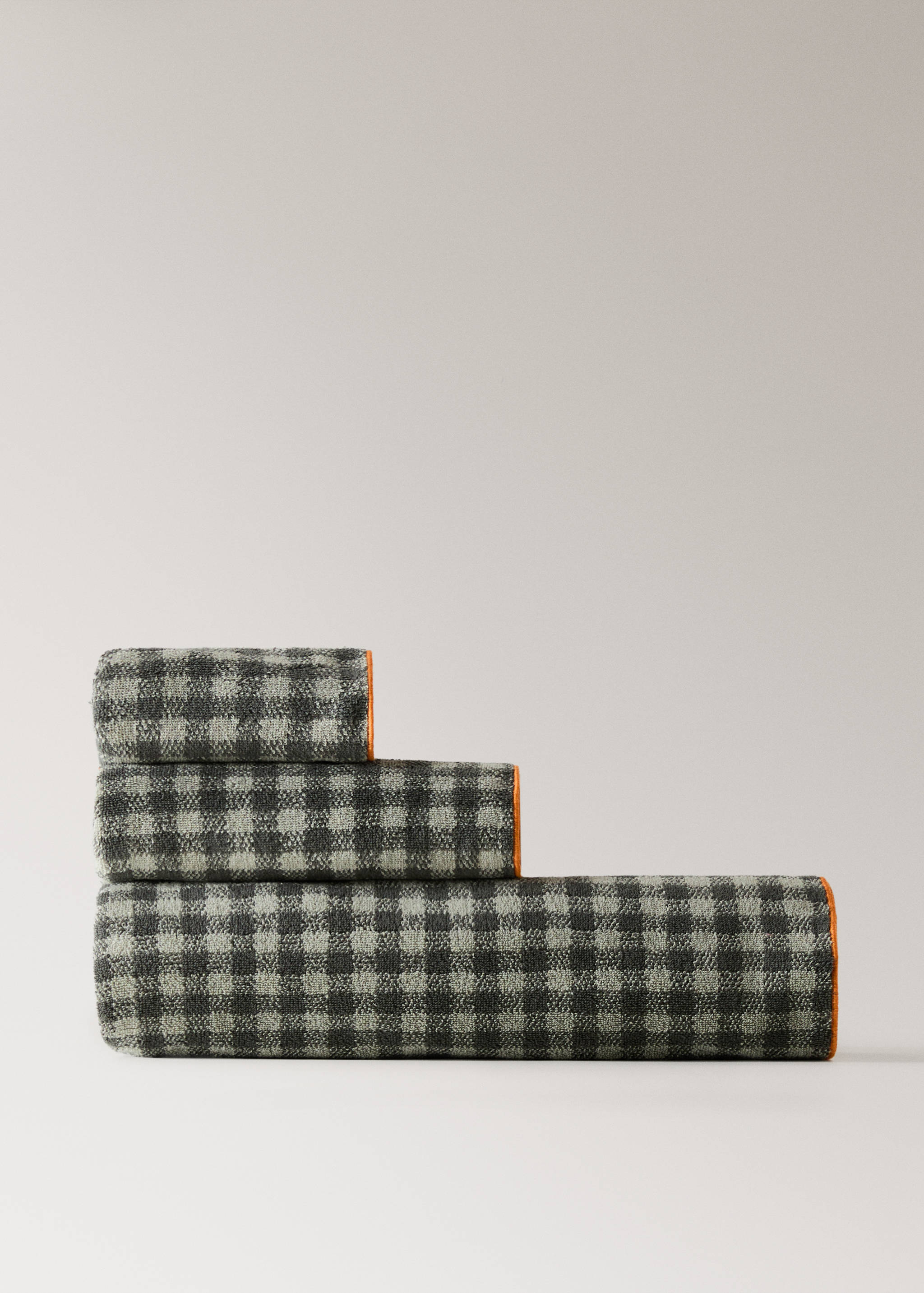 Cotton check-print guest towel with overlock stitching - Article without model