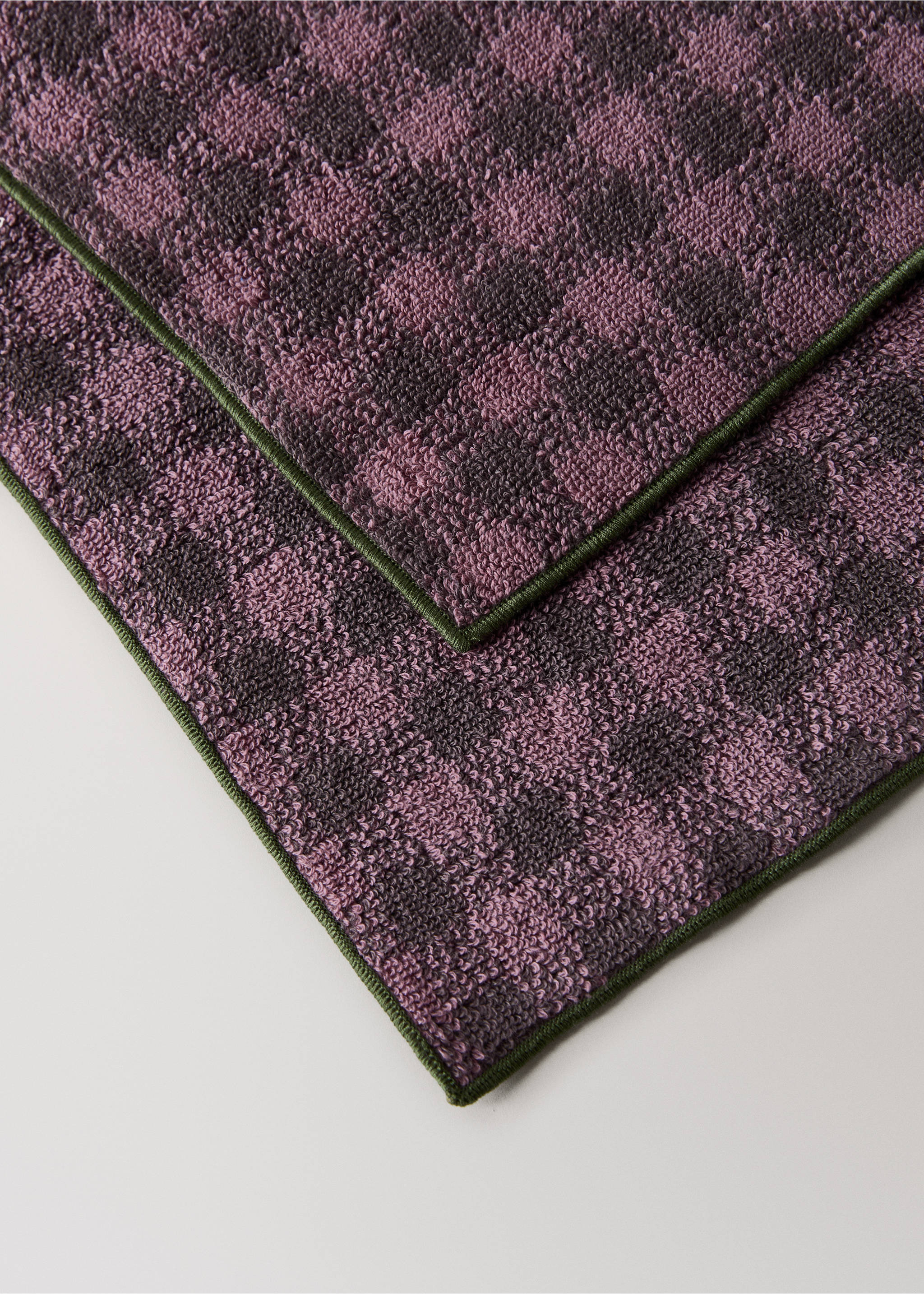 Purple checked towel with a soft terry texture and a green border., Purple. Ref: 17021614-00.